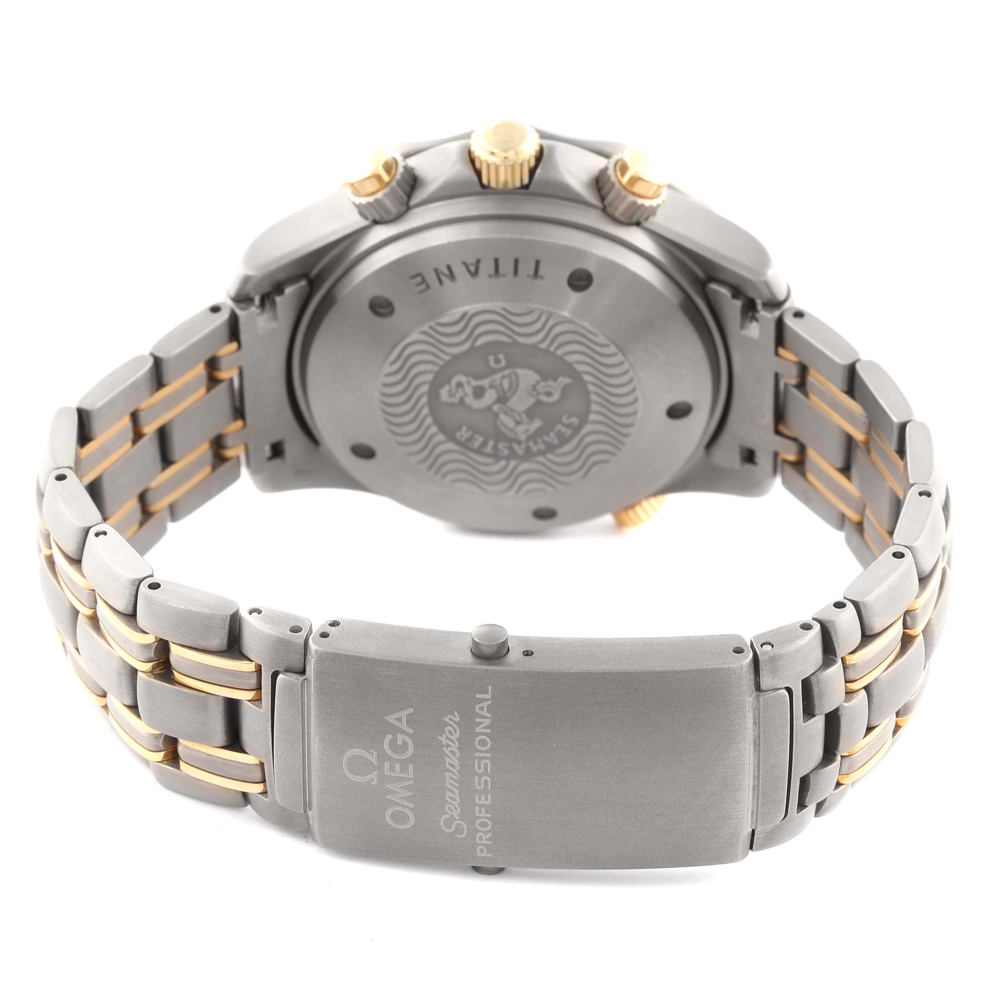 The Omega Seamaster 2297.80.00 Men's Steel and Gold (two tone) Blue Dial 2297.80.00 Men's Steel and Gold (two tone) Blue Dial watch is shown from the back, highlighting the case back, bracelet, and clasp.