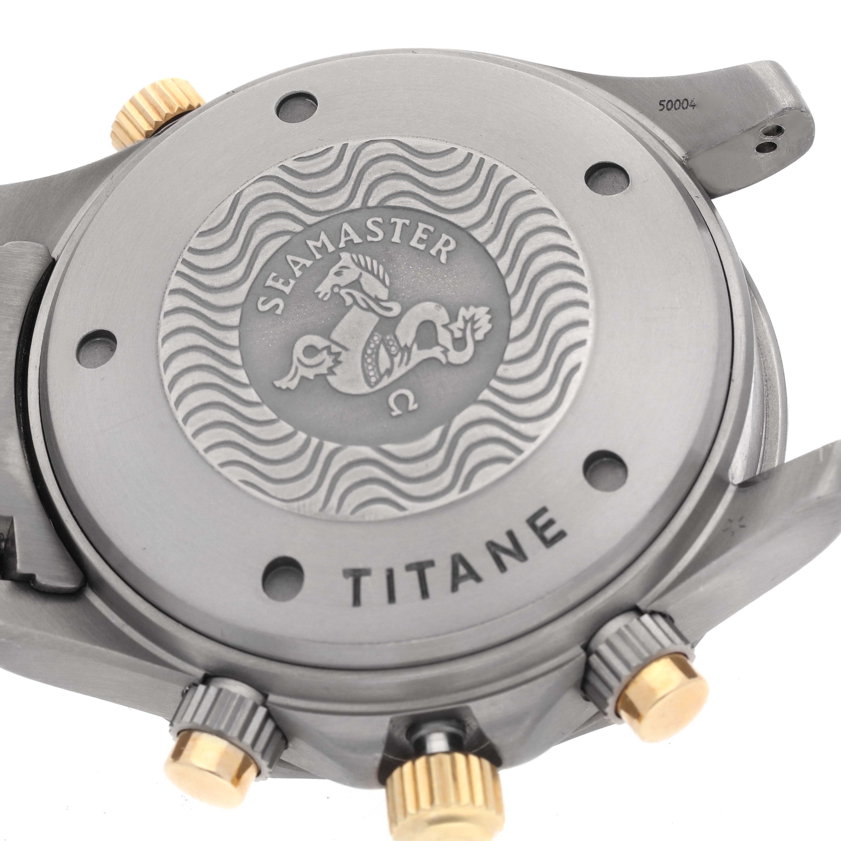 The image shows the back case of an Omega Seamaster 2297.80.00 Men's Steel and Gold (two tone) Blue Dial 2297.80.00 Men's Steel and Gold (two tone) Blue Dial, highlighting the branding and "TITANE" engraving.