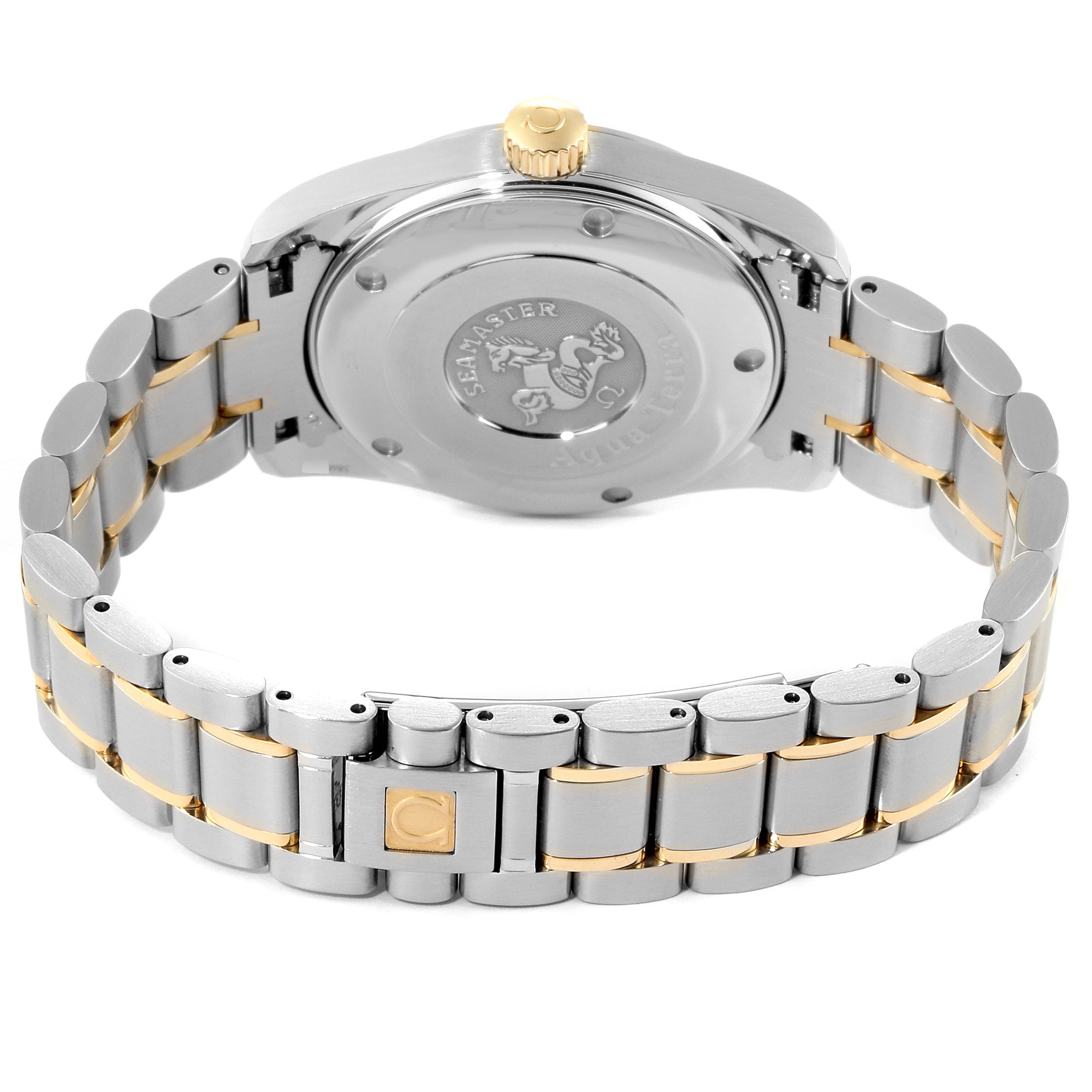 The image shows the back view of an Omega Seamaster 2318.30.00 Men's Steel and Gold (two tone) Silver Dial 2318.30.00 Men's Steel and Gold (two tone) Silver Dial watch, highlighting its two-tone metal bracelet and case back.