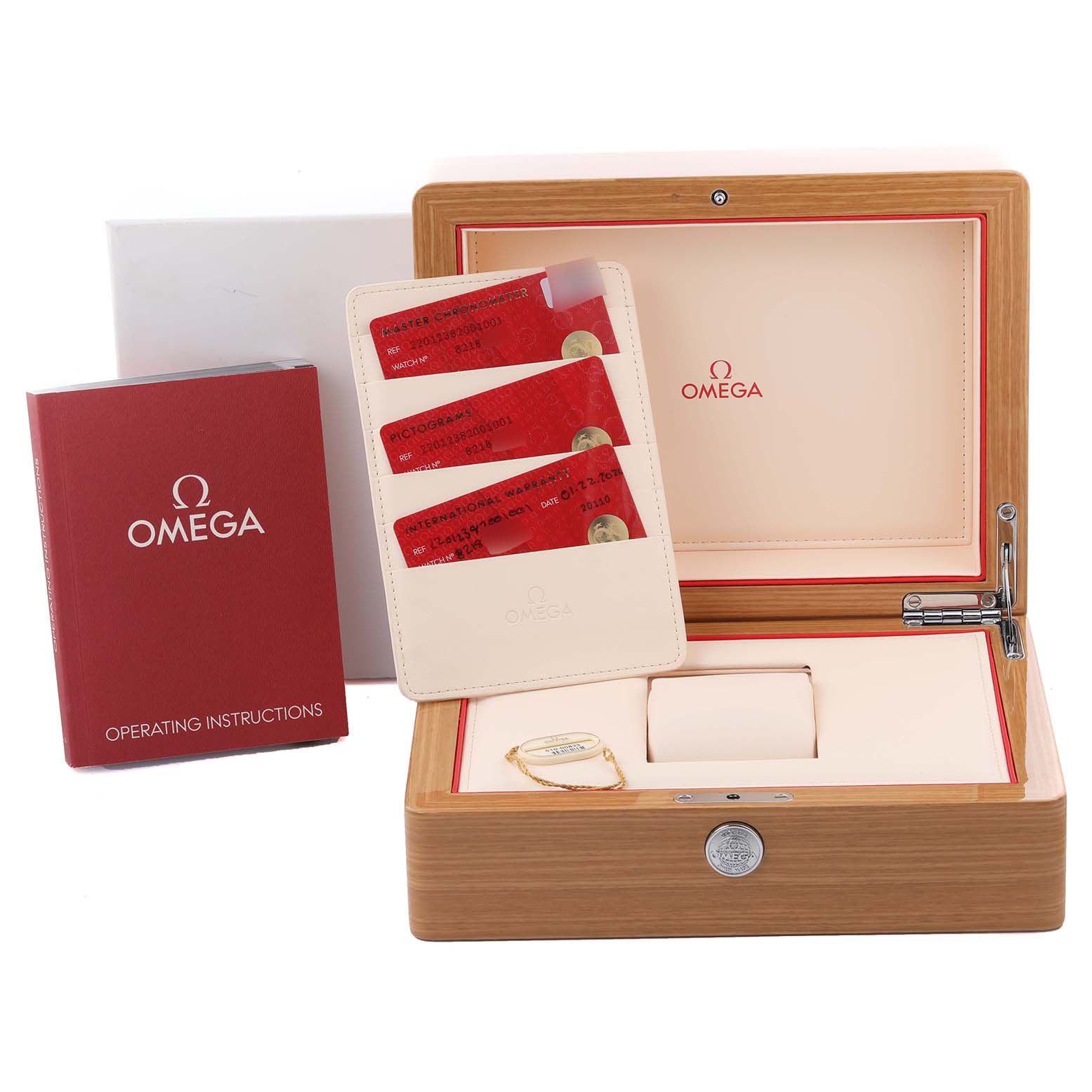 The image shows the Omega Aqua Terra 220.12.38.20.01.001 Men's Stainless Steel Black Dial 220.12.38.20.01.001 Men's Stainless Steel Black Dial watch box, instruction manual, warranty cards, and an accessory holder.