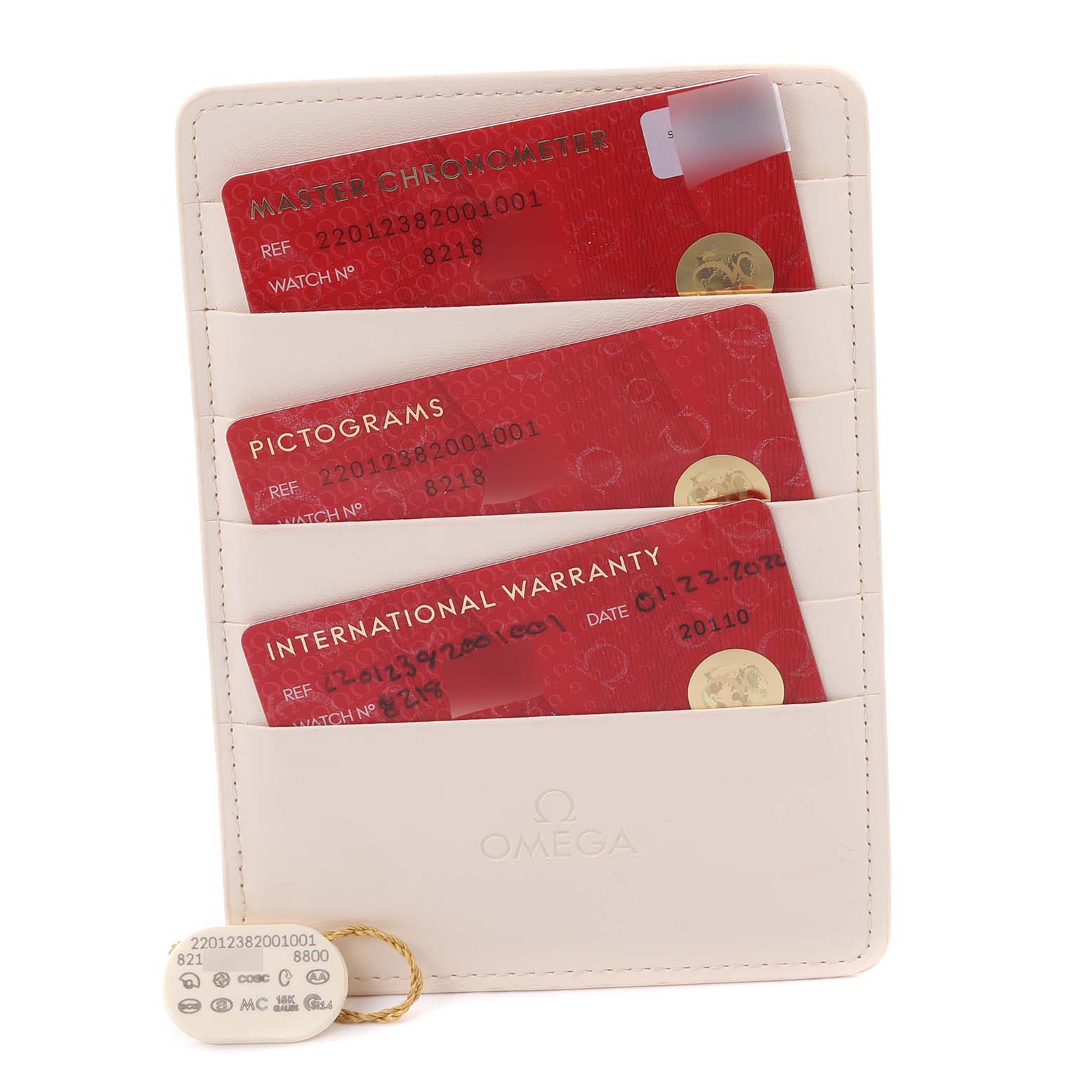 The image shows Omega Aqua Terra 220.12.38.20.01.001 Men's Stainless Steel Black Dial 220.12.38.20.01.001 Men's Stainless Steel Black Dial accessories including a wallet with three cards and a tag on a white background.