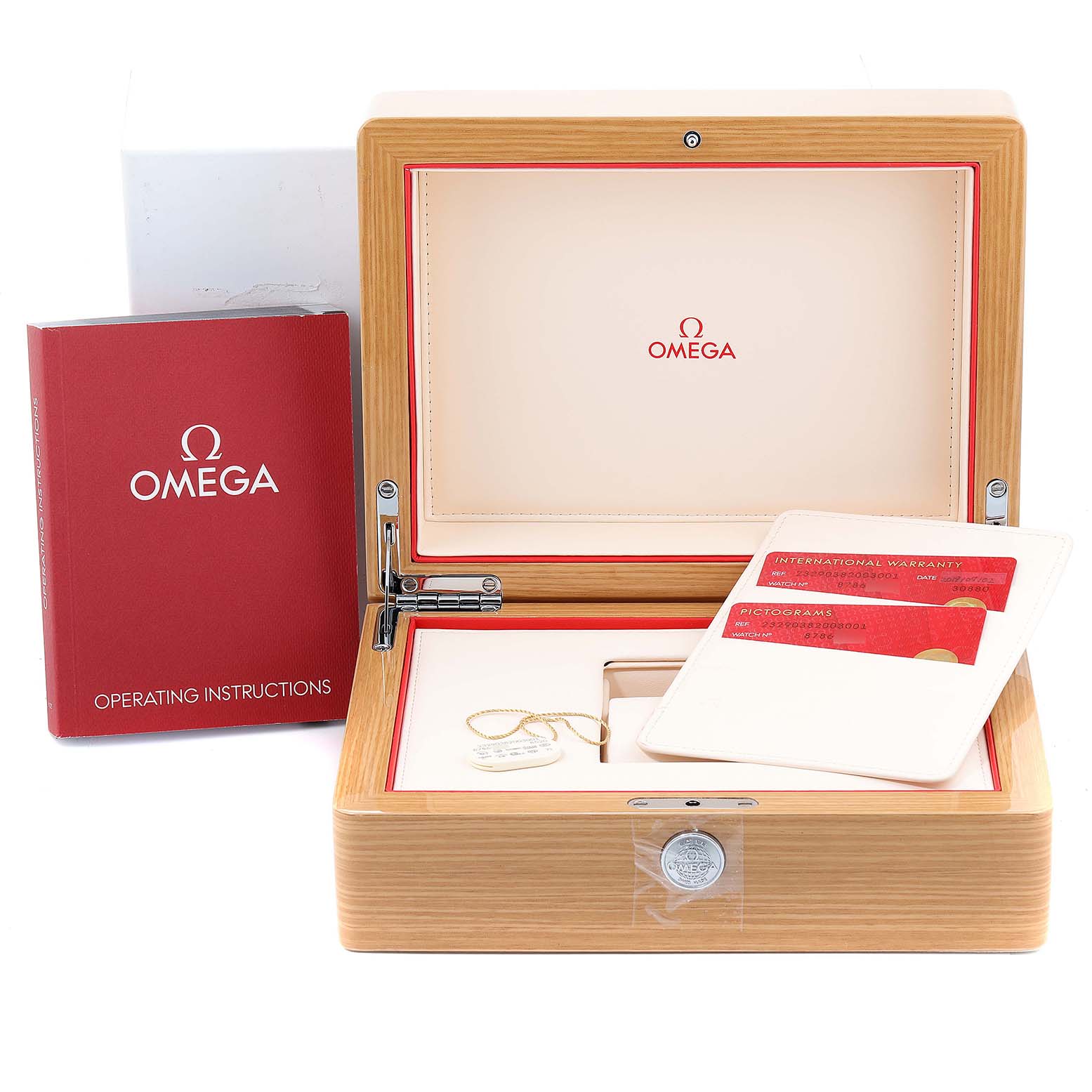 The image shows an Omega Planet Ocean 232.90.38.20.03.001 Men's Titanium Blue Dial 232.90.38.20.03.001 Men's Titanium Blue Dial watch box, operating instructions, warranty cards, and a pictogram card.