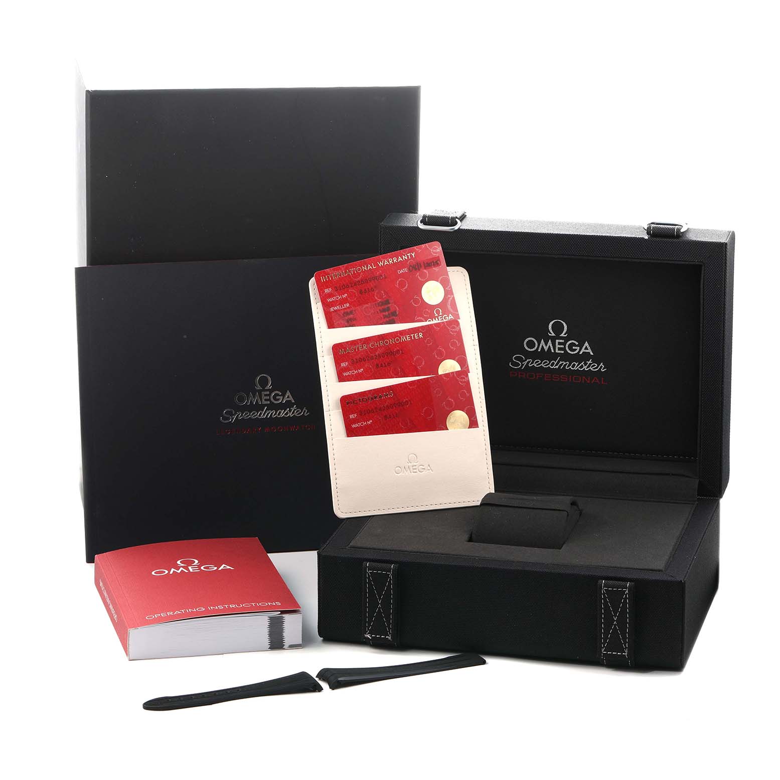 The image shows the Omega Speedmaster 310.62.42.50.99.001 Men
s Yellow Gold Yellow Dial box, warranty cards, instruction manual, and strap tools from a front angle.