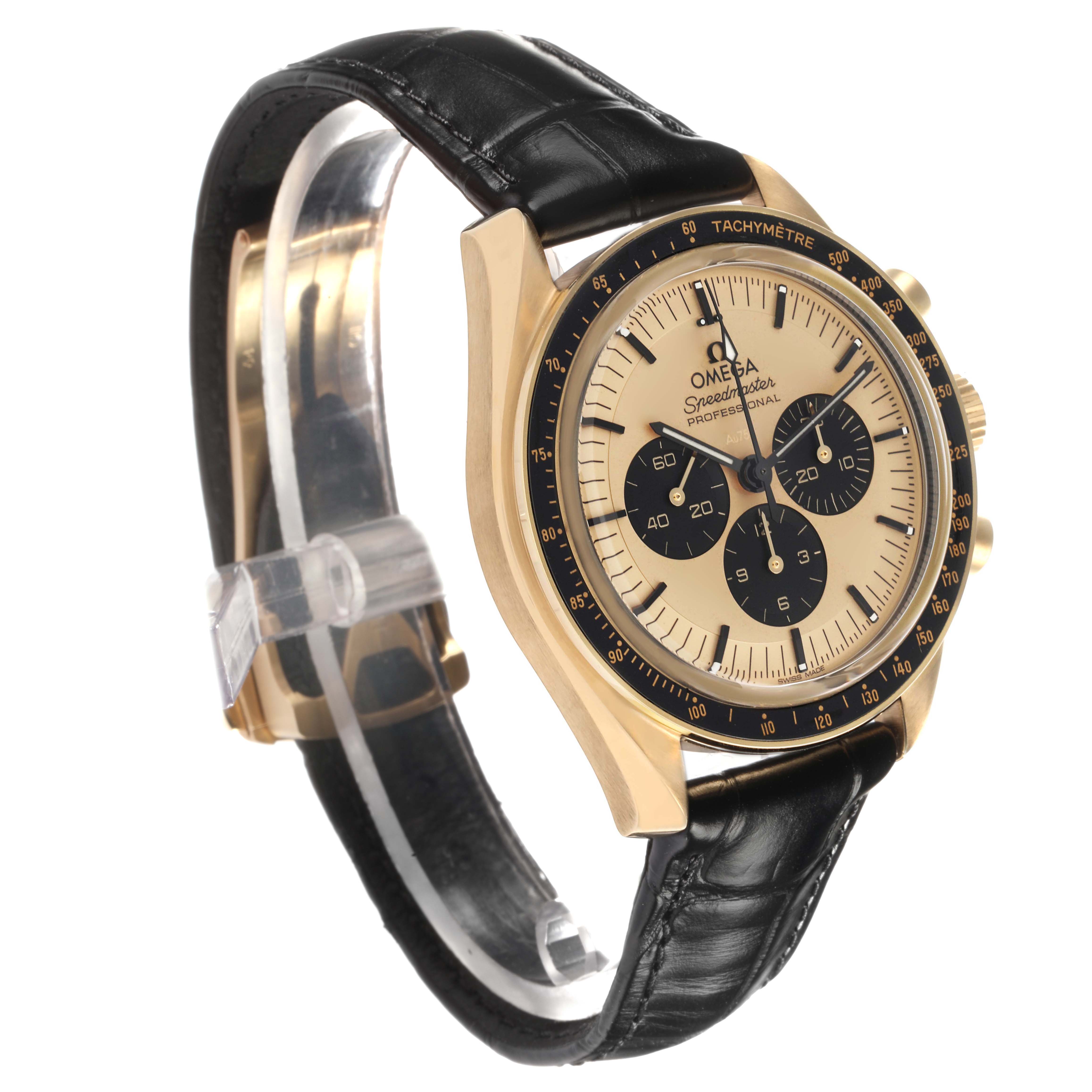 The Omega Speedmaster 310.62.42.50.99.001 Men
s Yellow Gold Yellow Dial watch is shown at a three-quarter angle, highlighting the face, gold case, black subdials, and leather strap.
