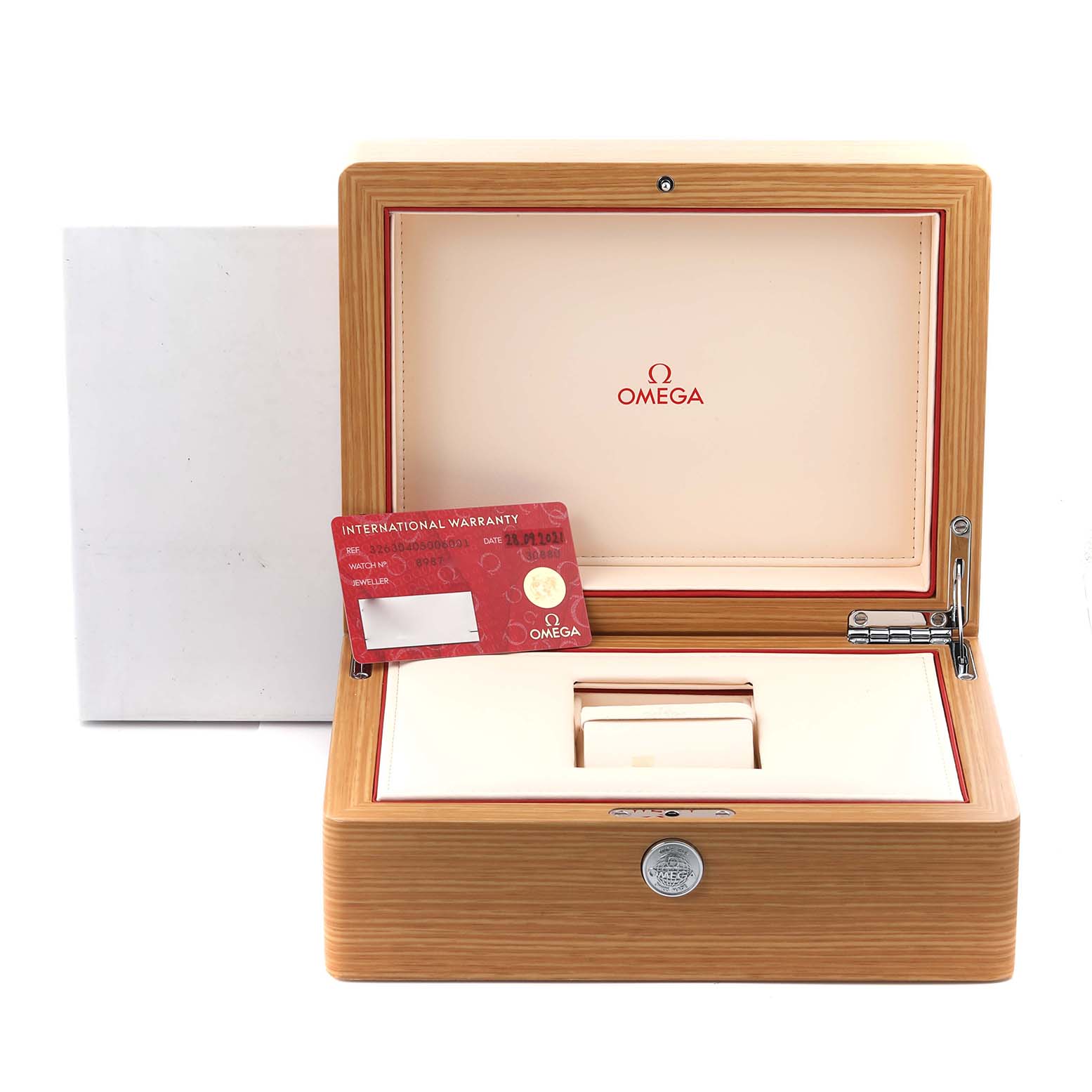 The image shows a wooden Omega Speedmaster 326.30.40.50.06.001 Men's Stainless Steel Grey Dial 326.30.40.50.06.001 Men's Stainless Steel Grey Dial box, open with an international warranty card displayed.