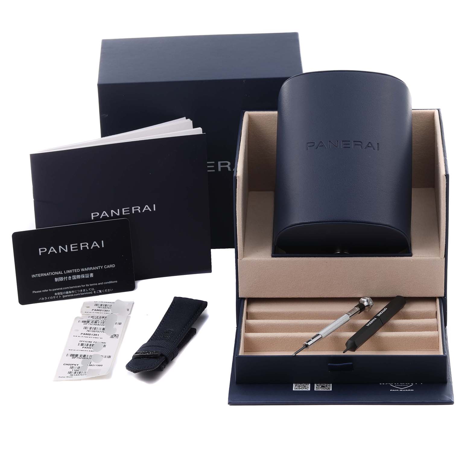 The Panerai Submersible PAM01391 Men's Stainless Steel Blue Dial PAM01391 Men's Stainless Steel Blue Dial accessories are shown, including a case, warranty card, strap, and tools from a top view.