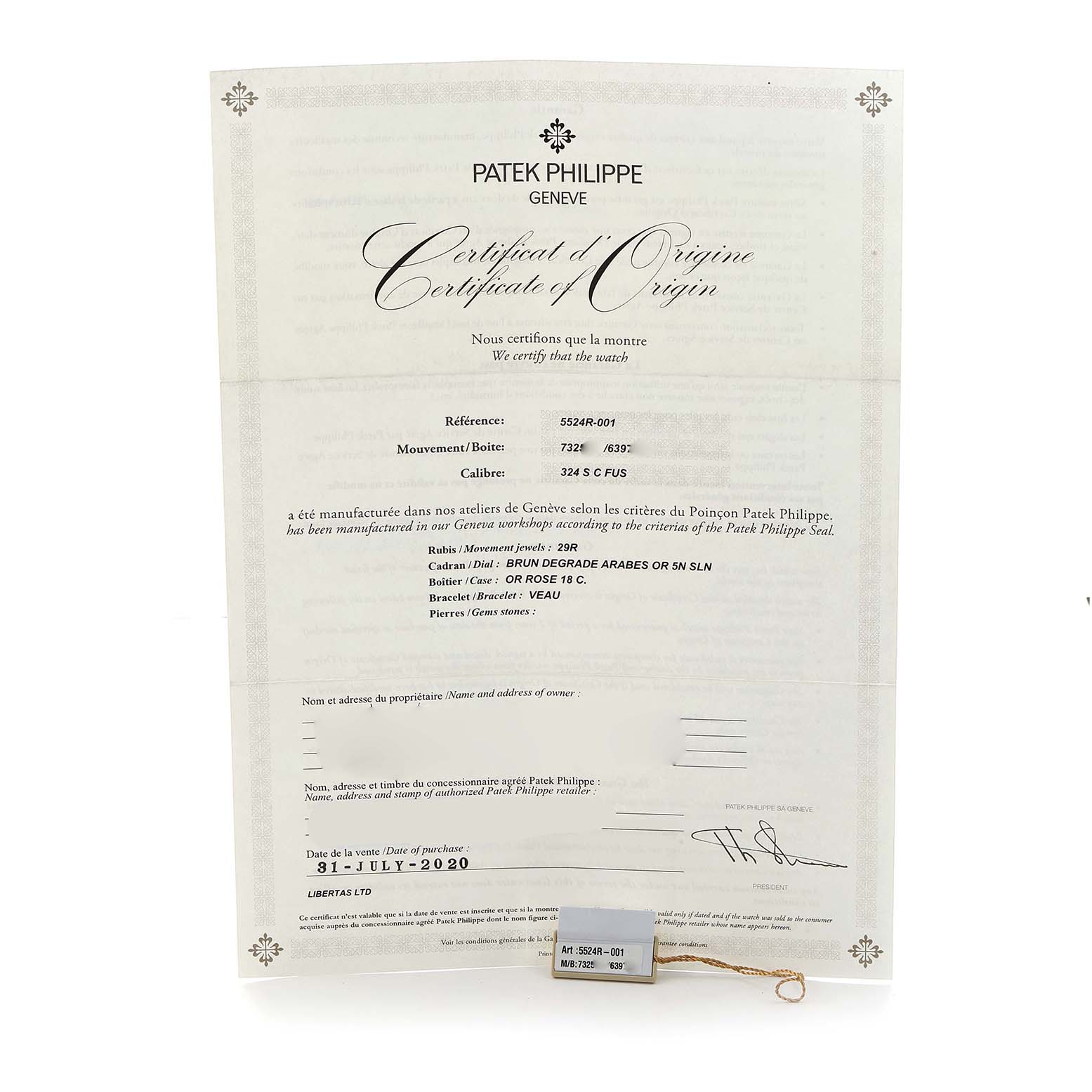 The image shows a Patek Philippe Calatrava 5524R Men's Rose Gold Brown Dial model certificate of origin and a tag with its reference number.