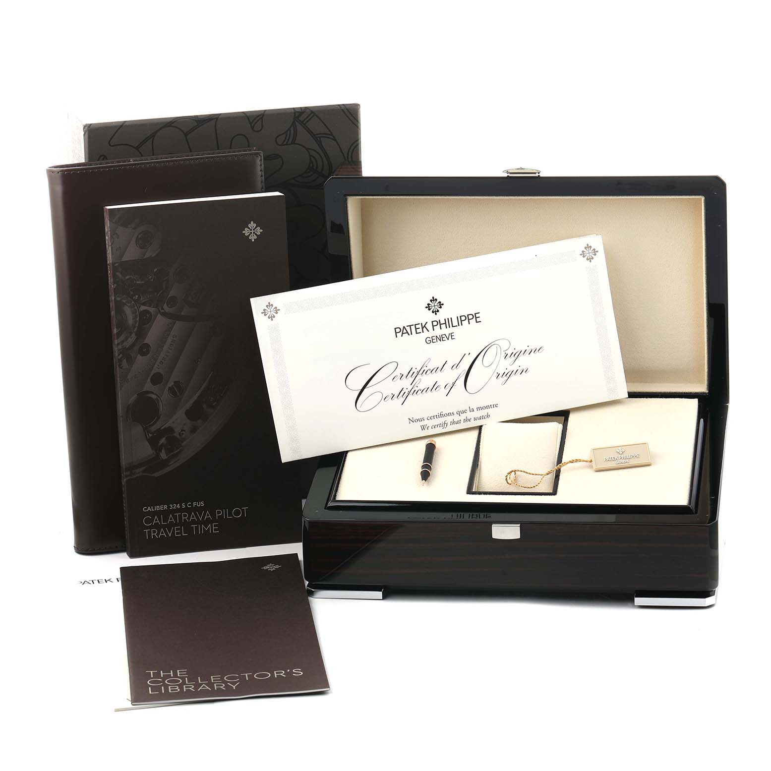 The image shows a Patek Philippe Calatrava 5524R Men's Rose Gold Brown Dial watch box with accessories, including a certificate, pen, and tag, viewed from the front.