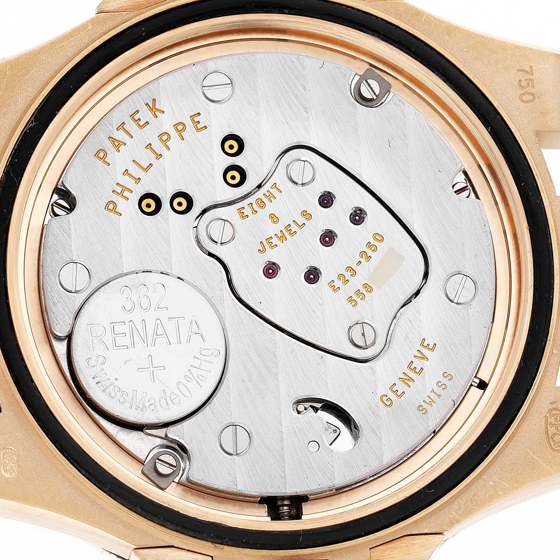 The image shows the back of a Patek Philippe Nautilus 7010/1R-010 Women's Rose Gold Grey Dial watch, highlighting its movement and battery.