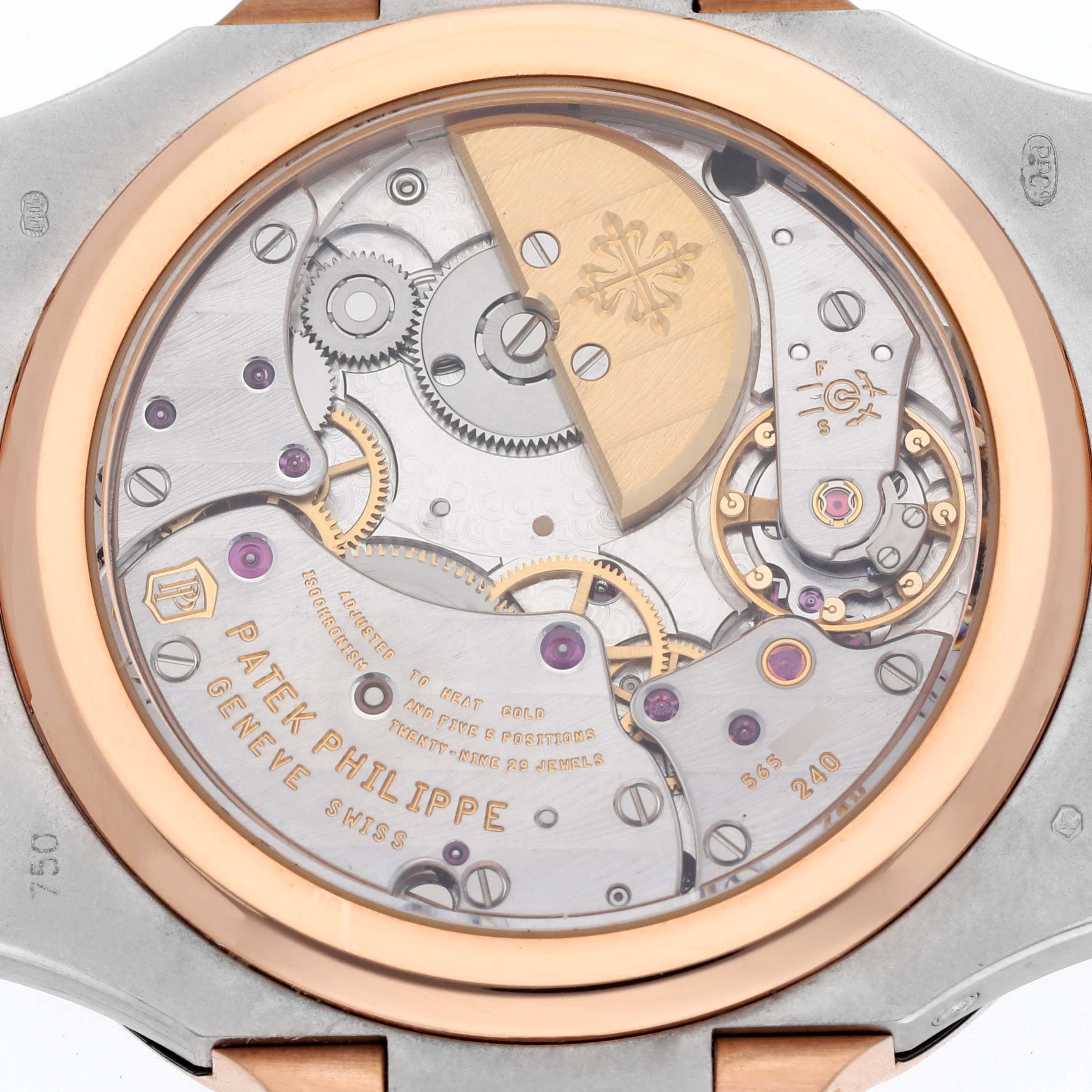 The image shows the back of a Patek Philippe Nautilus 5712GR-001 Men's White Gold Grey Dial 5712GR-001 Men's White Gold Grey Dial, highlighting the exposed mechanical movement.