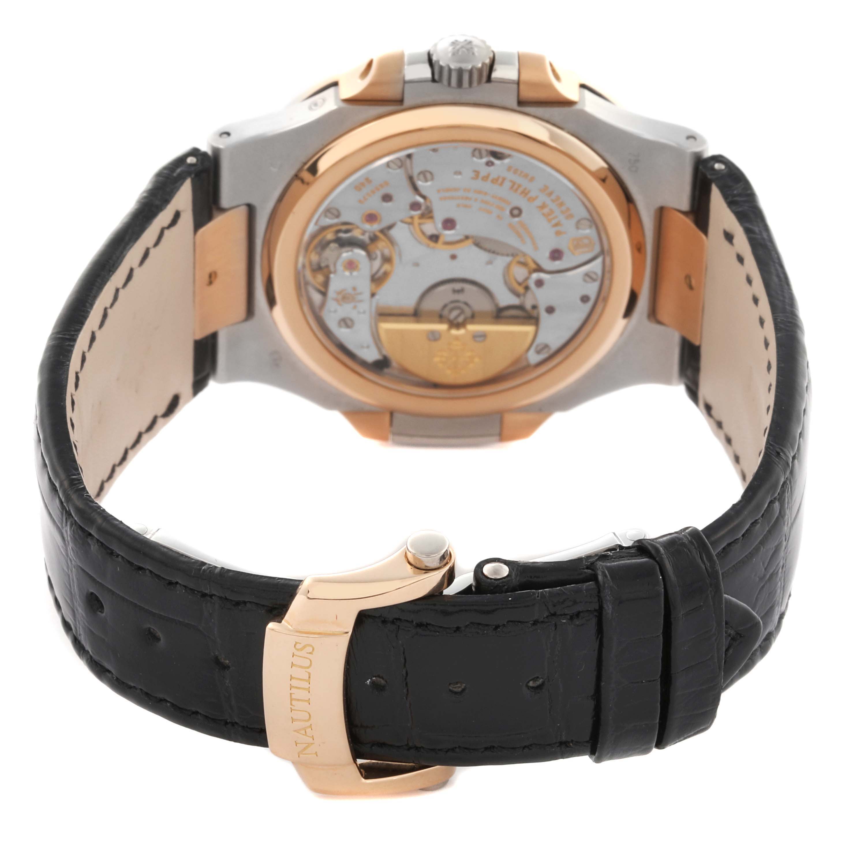 The image shows the back view of a Patek Philippe Nautilus 5712GR-001 Men's White Gold Grey Dial 5712GR-001 Men's White Gold Grey Dial watch, highlighting the exposed movement and clasp of the leather strap.