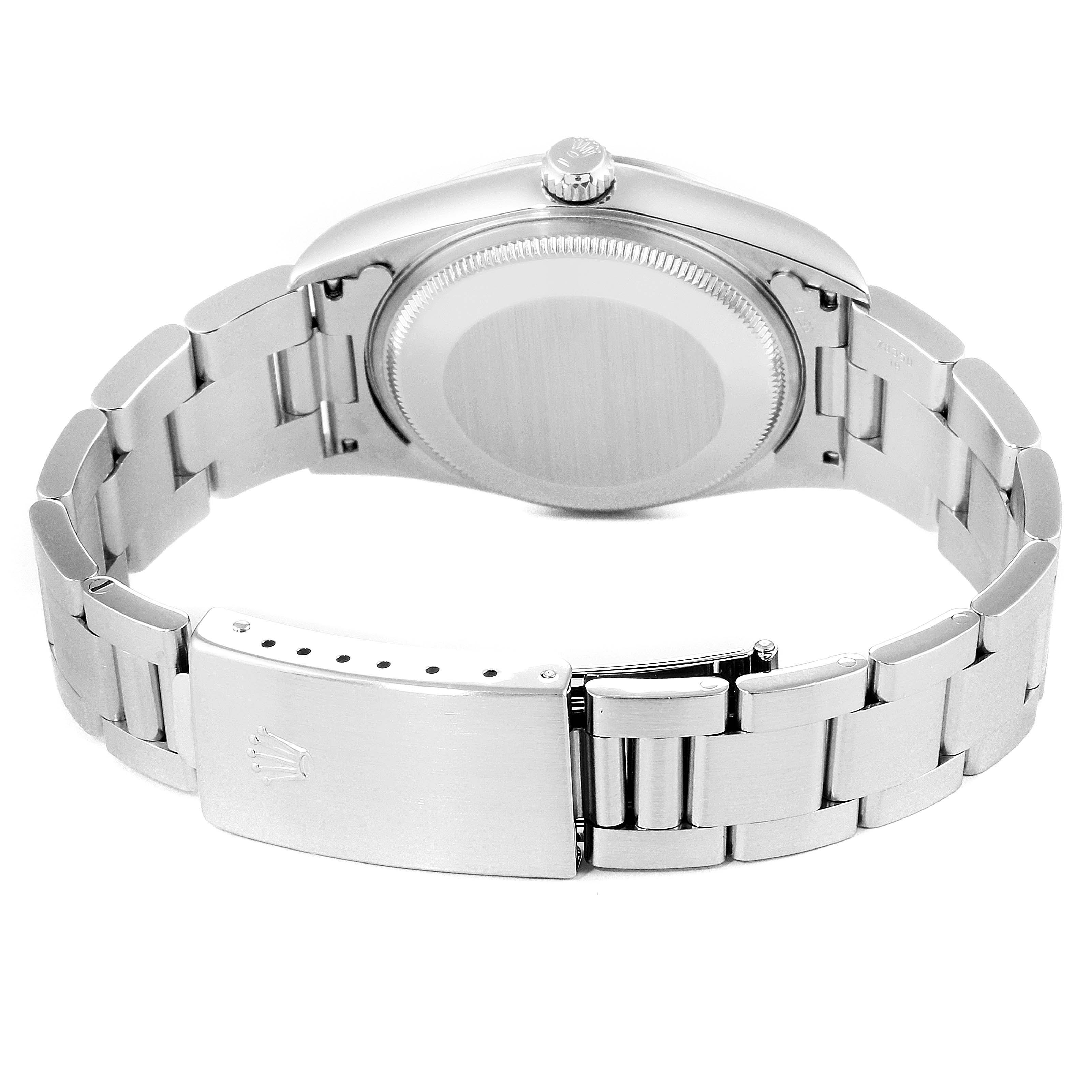 The image shows the back side of the Rolex Air-King 14000 Men's Stainless Steel Pink Dial 14000 Men's Stainless Steel Pink Dial watch, highlighting the case back and bracelet with the clasp opened.