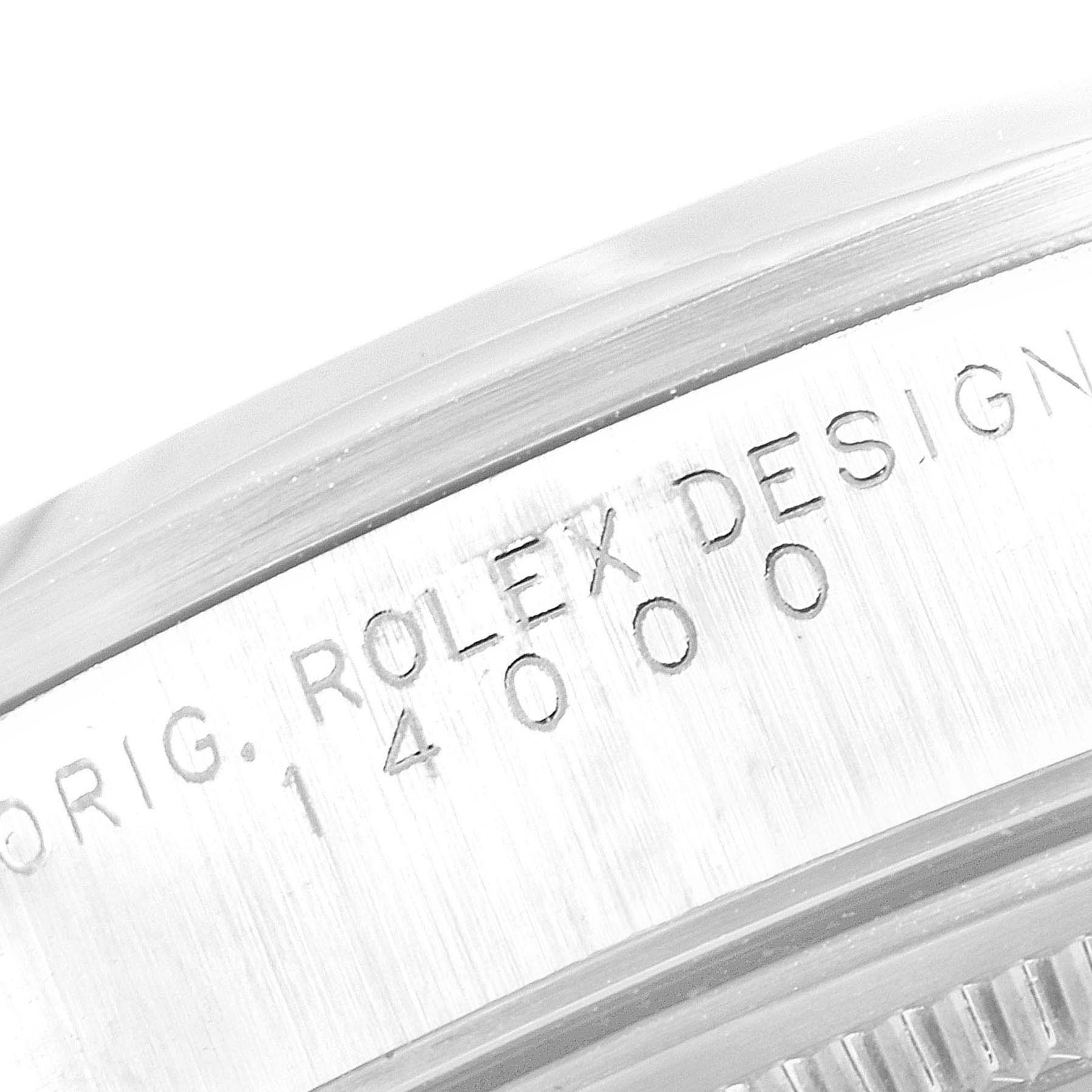 This image shows a close-up of the case side of a Rolex Air-King 14000 Men's Stainless Steel Pink Dial 14000 Men's Stainless Steel Pink Dial watch, highlighting the engraved model number "14000."