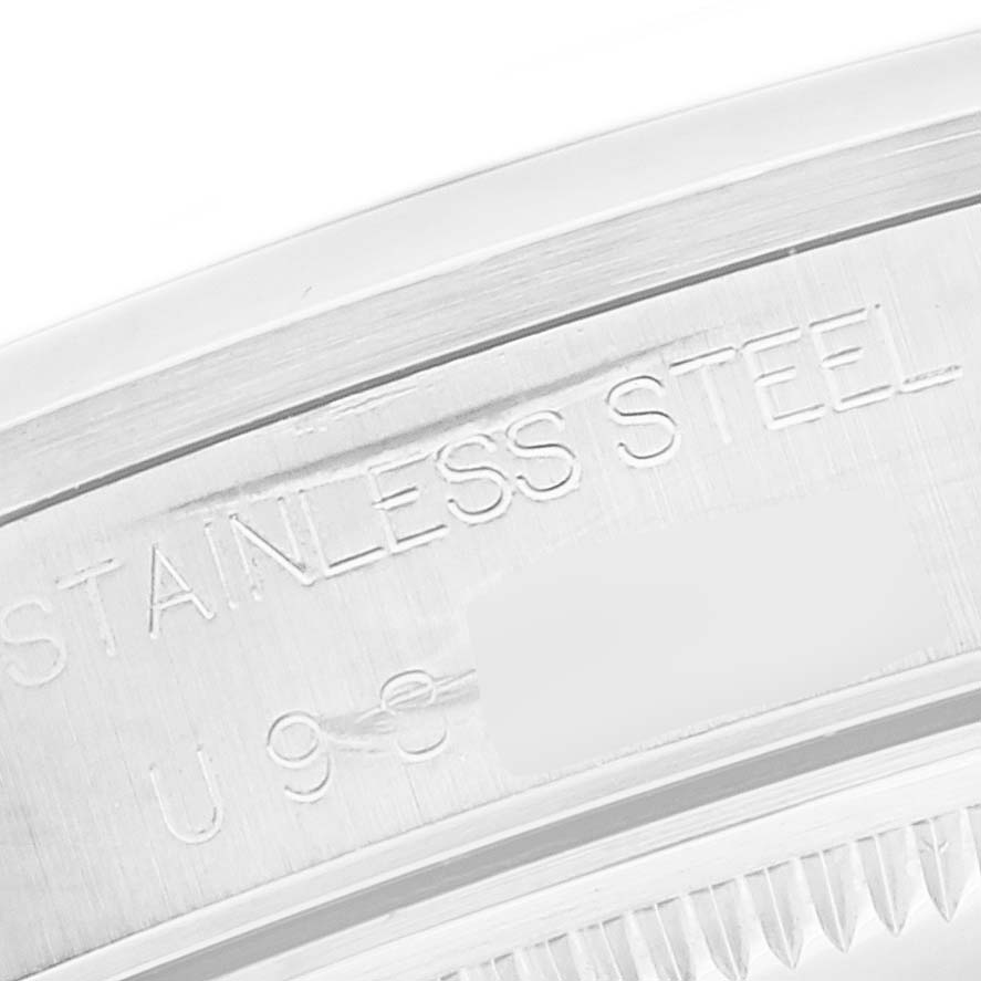 This image shows a close-up of the case back of a Rolex Air-King 14000 Men's Stainless Steel Silver Dial 14000 Men's Stainless Steel Silver Dial watch with "STAINLESS STEEL" engraved.