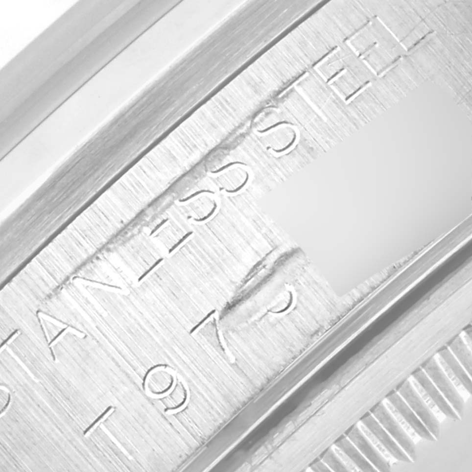 The image shows a close-up of the engraving on the Rolex Air-King 14000 Men's Stainless Steel Silver Dial 14000 Men's Stainless Steel Silver Dial's stainless steel case side.