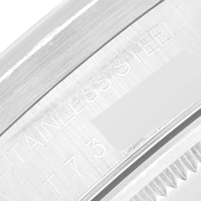 This close-up shows the stainless steel inscription on the case back of the Rolex Air-King 14010 Men's Stainless Steel Black Dial 14010 Men's Stainless Steel Black Dial.