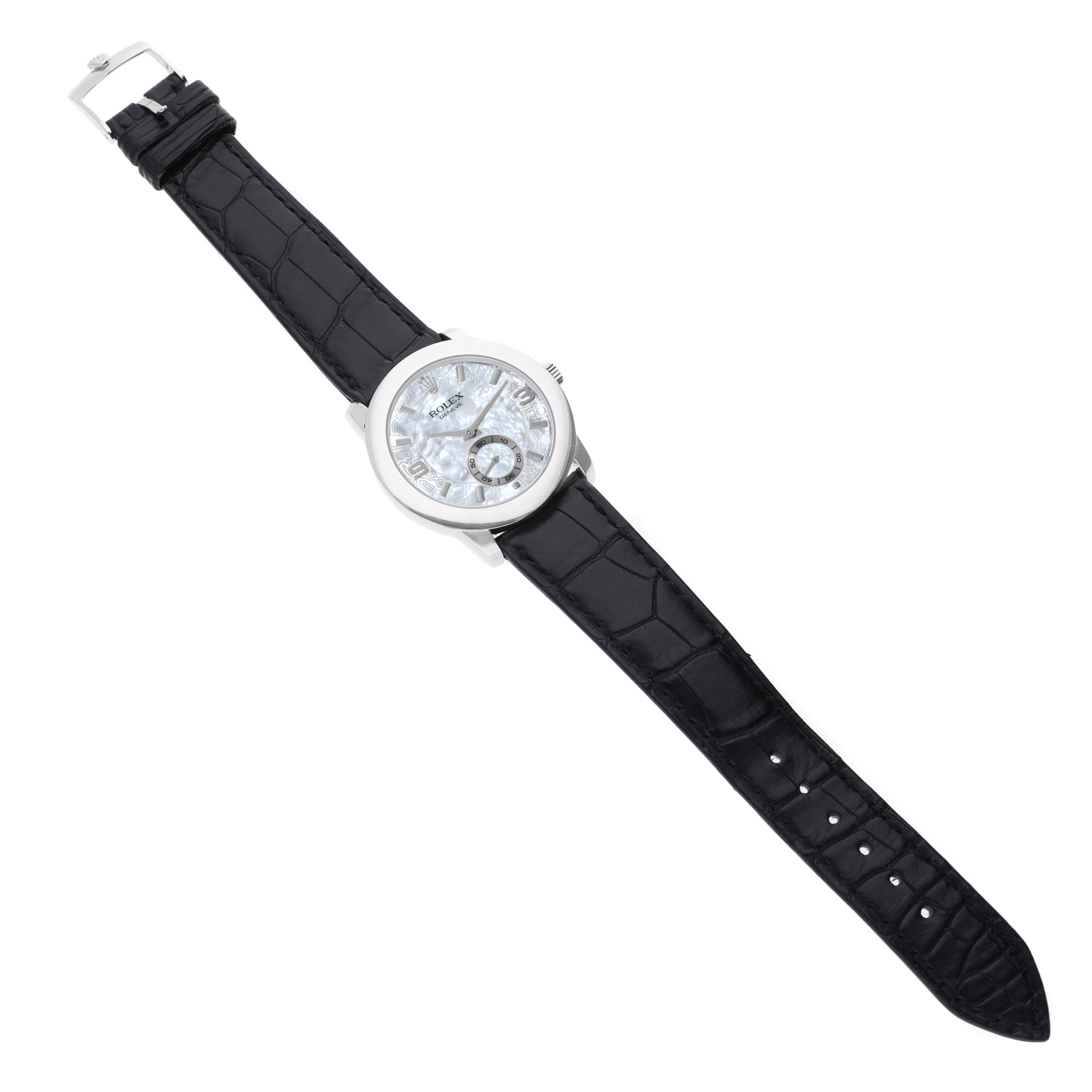 The Rolex Cellini 5240 Men's Platinum Mother of Pearl Dial 5240 Men's Platinum Mother of Pearl Dial watch is shown from a top view, displaying the full face, black leather strap, and buckle.