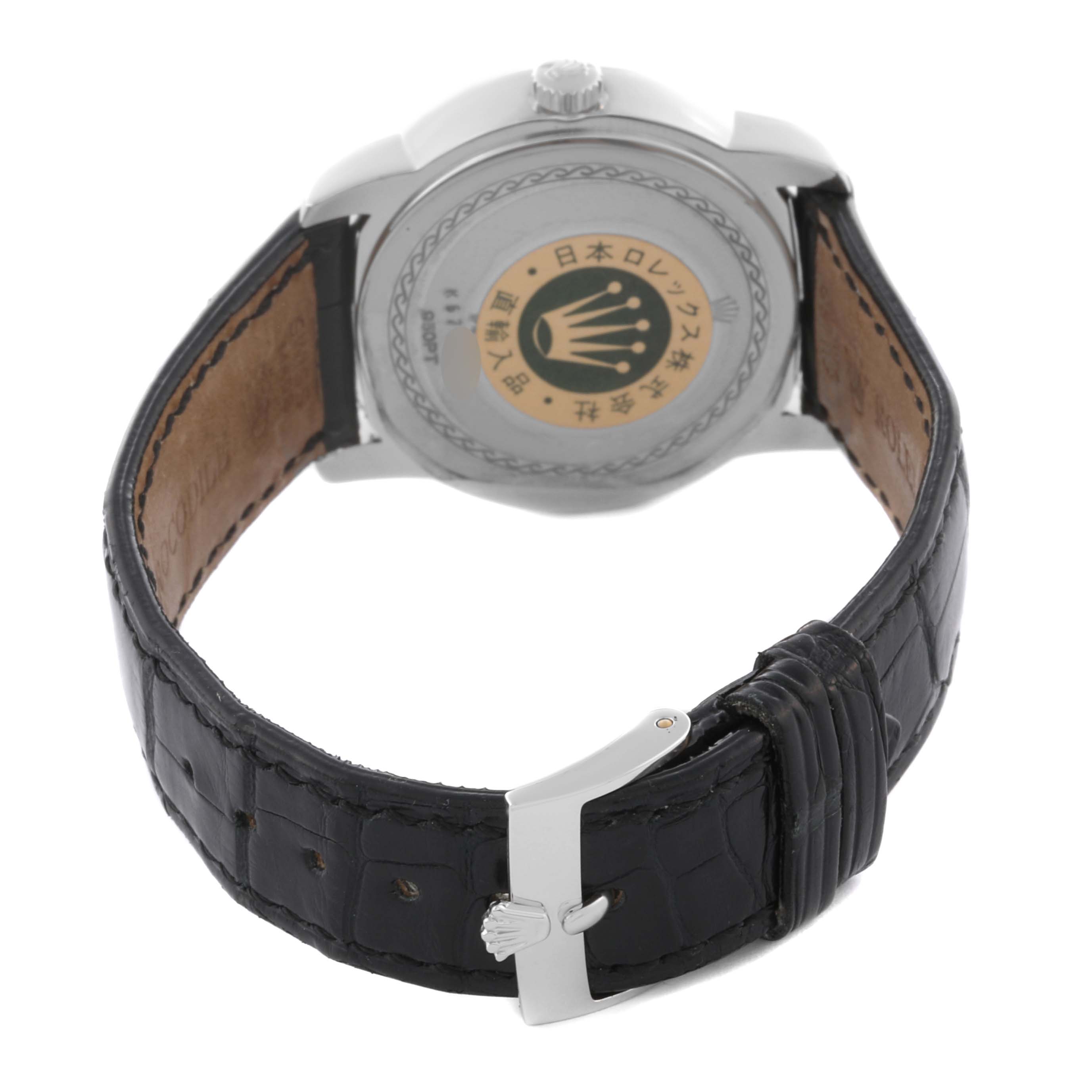 The Rolex Cellini 5240 Men's Platinum Mother of Pearl Dial 5240 Men's Platinum Mother of Pearl Dial watch is shown from the back, highlighting the case back, leather strap, and clasp.