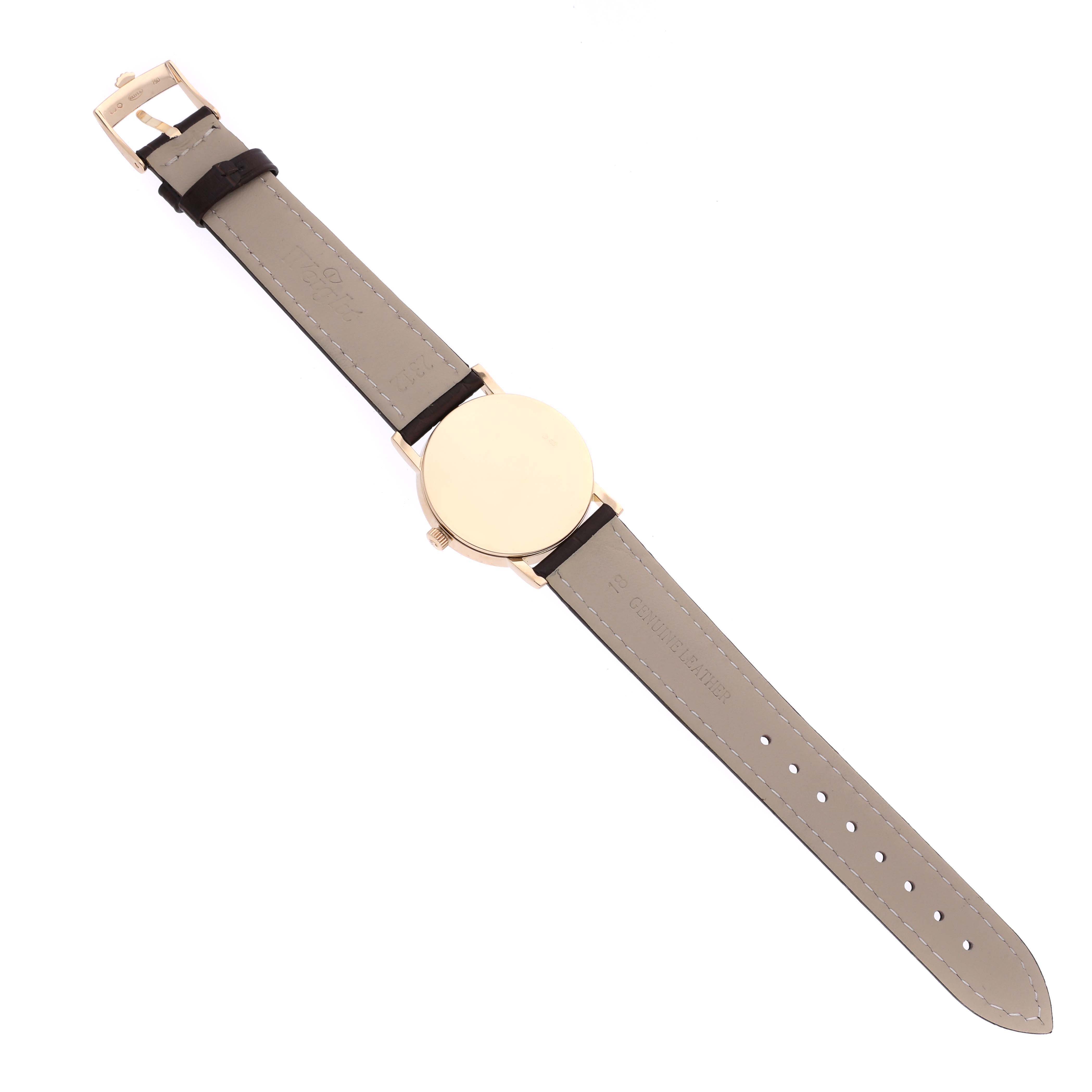 The Rolex Cellini 5115 Men's Yellow Gold Silver Dial 5115 Men's Yellow Gold Silver Dial watch is shown from the back, highlighting the leather strap and buckle.