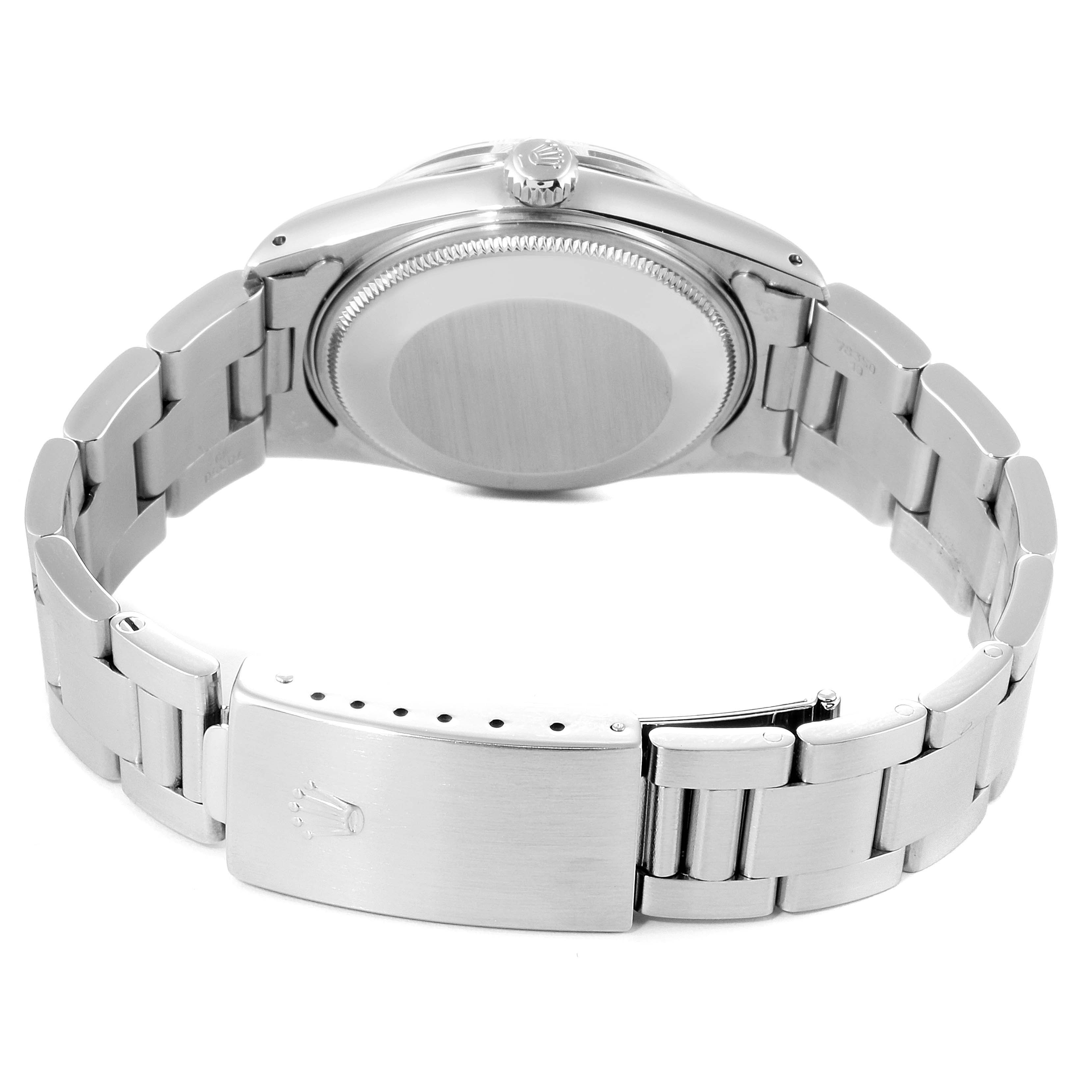 This image shows the back side and clasp of a Vintage Collection Rolex watch.