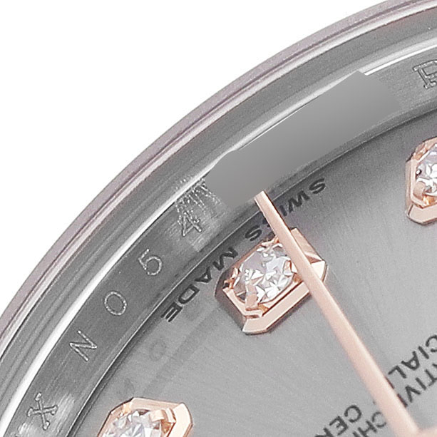 The image shows a close-up of a Rolex Datejust 179171 Women's Steel and Gold (two tone) Silver Dial watch dial, focusing on diamond hour markers and part of the hour hand.