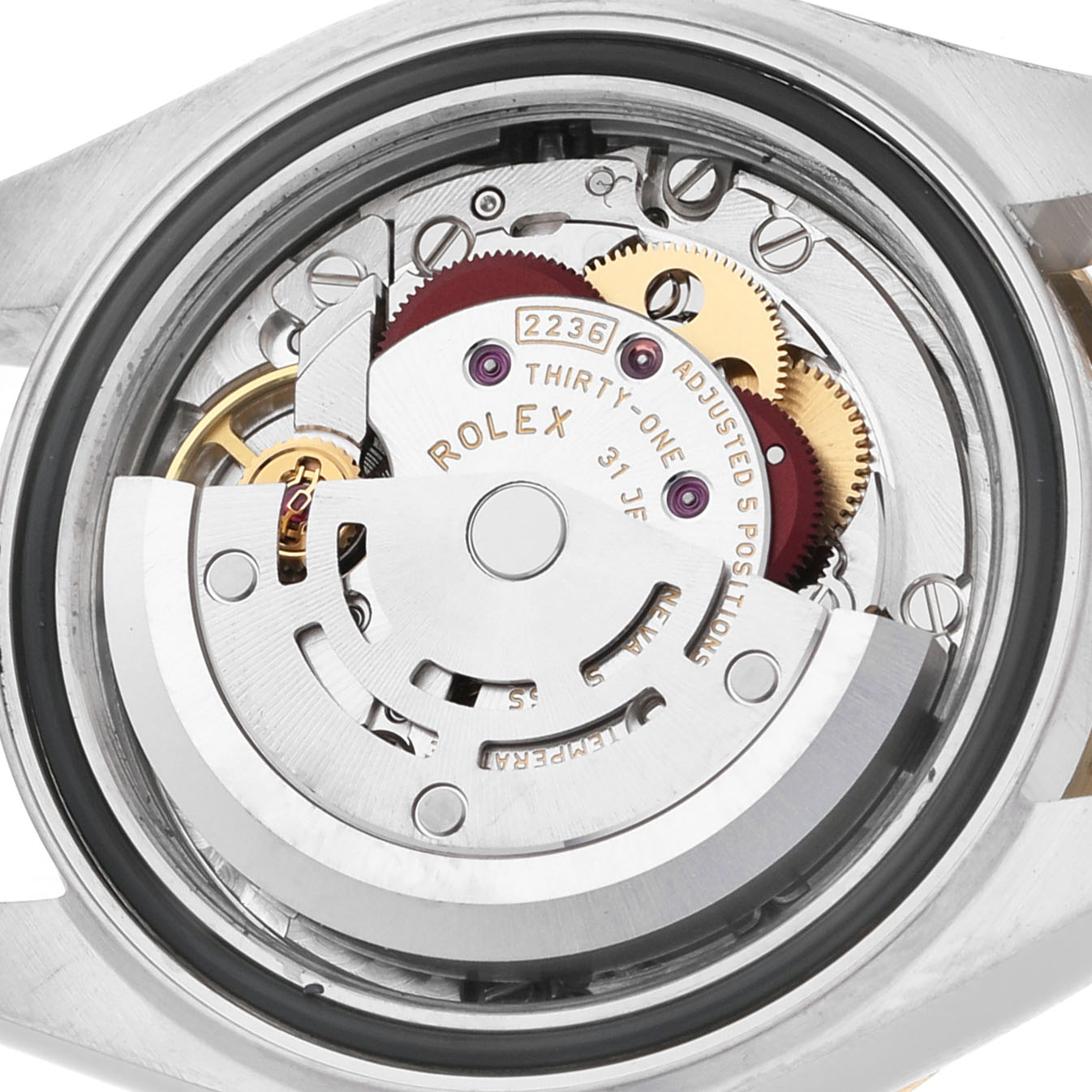 The image shows the movement mechanism of a Rolex Datejust 279173 Women's Stainless Steel Champagne Dial, viewed from the back with visible gears and inscriptions.