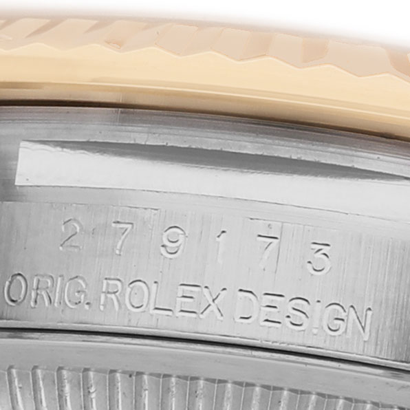 The image shows a close-up of the case side of a Rolex Datejust 279173 Women's Stainless Steel Champagne Dial with engraved model details.