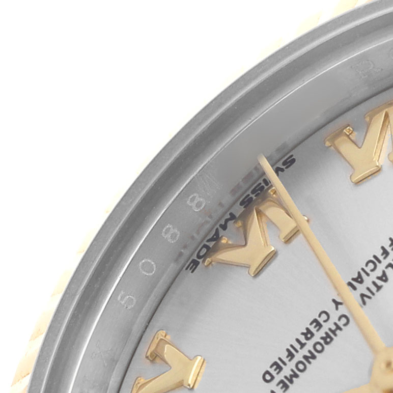 The image shows a close-up of the dial and bezel of the Rolex Datejust 279173 Women's Steel and Gold (two tone) Silver Dial, highlighting hour markers and part of the face.