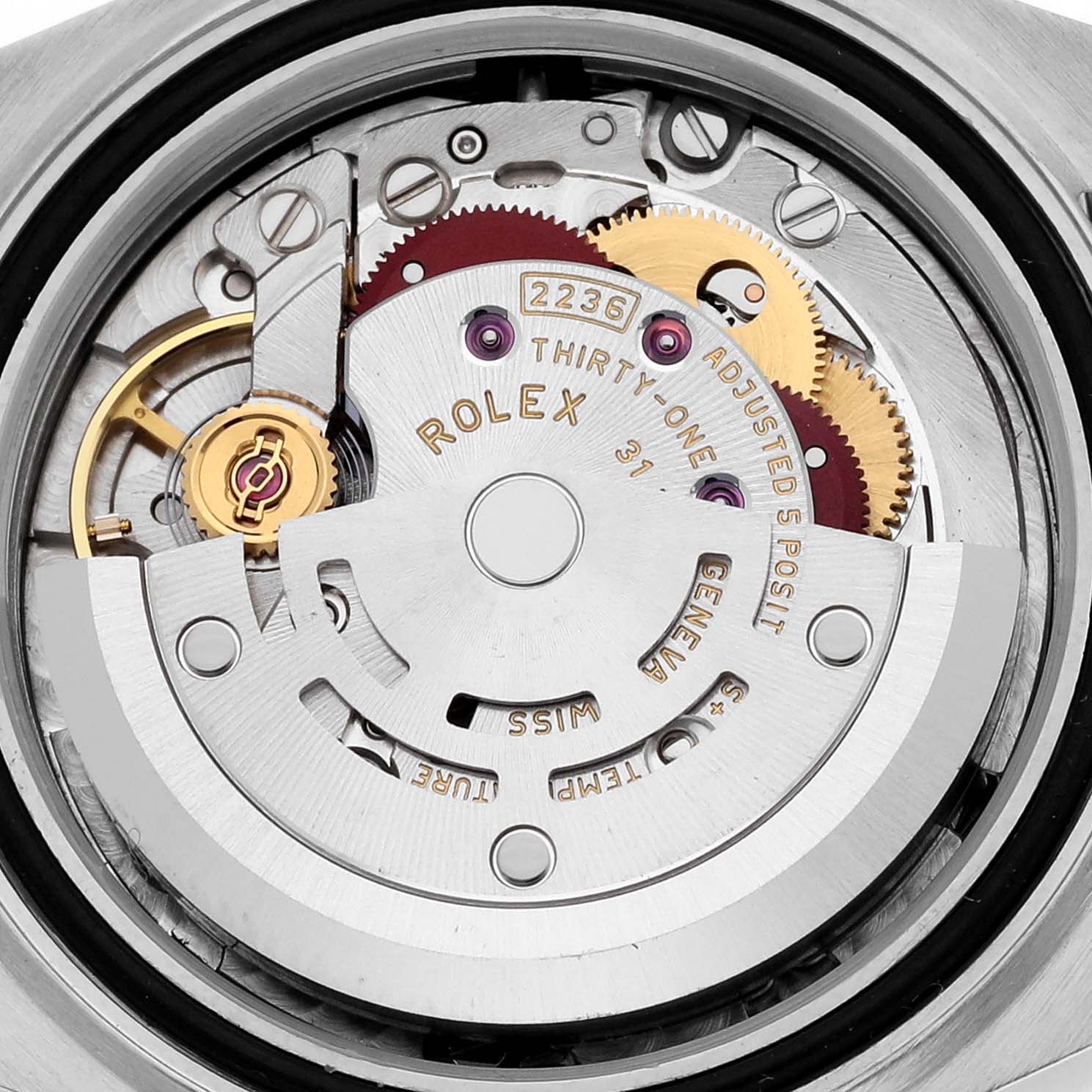 The image shows the movement of a Rolex Datejust 279173 Women's Steel and Gold (two tone) Silver Dial 279173 Women's Steel and Gold (two tone) Silver Dial, highlighting the rotor, gears, and mechanisms from the back.
