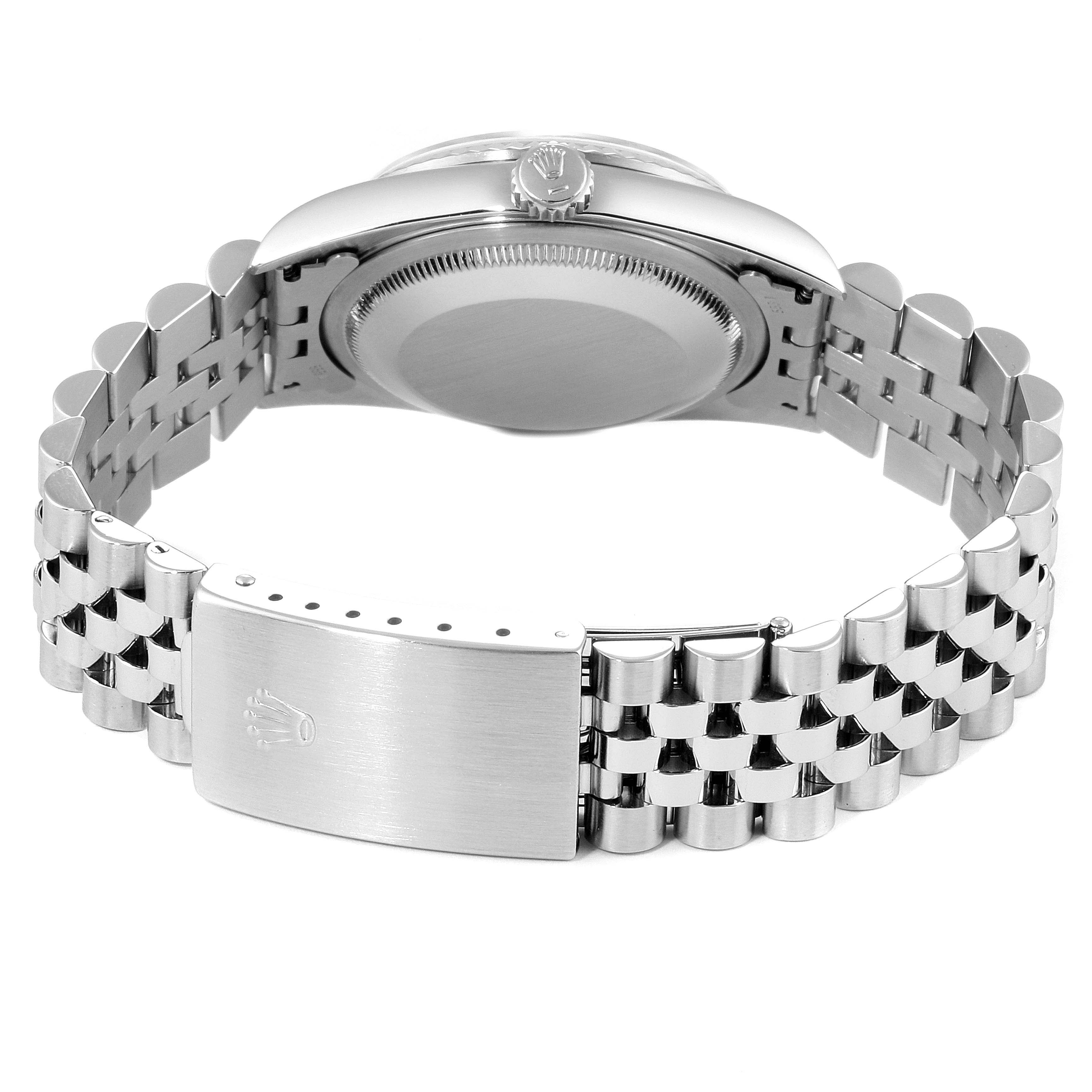 This image shows the backside of a Rolex Datejust 16234 Men's Stainless Steel Pink Dial 16234 Men's Stainless Steel Pink Dial watch, focusing on the bracelet and clasp with the case back visible.