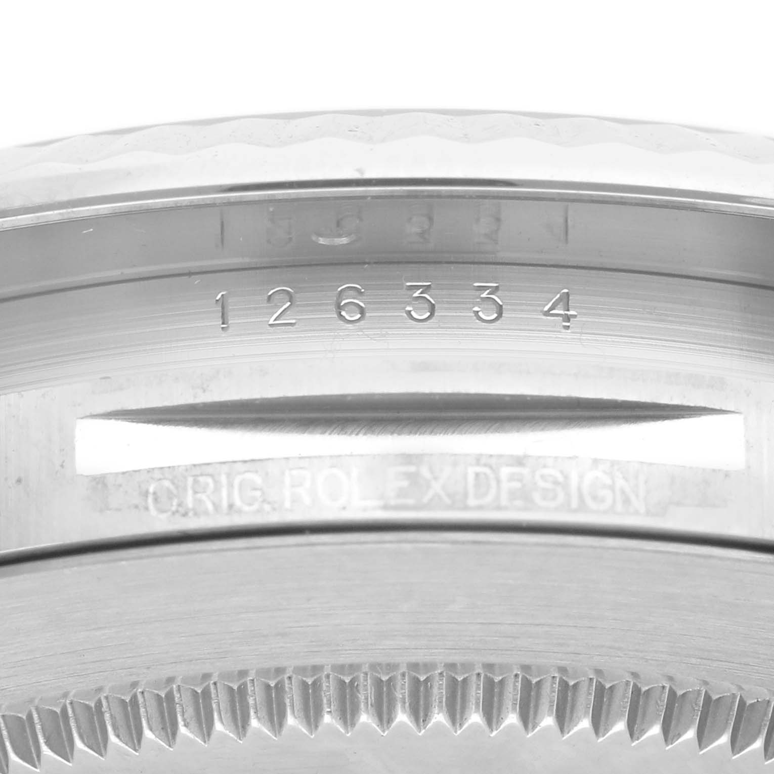 The image shows the side of a Rolex Datejust 41 126334 Men's Stainless Steel Green Dial 126334 Men's Stainless Steel Green Dial, focusing on the watch case and model numbers.