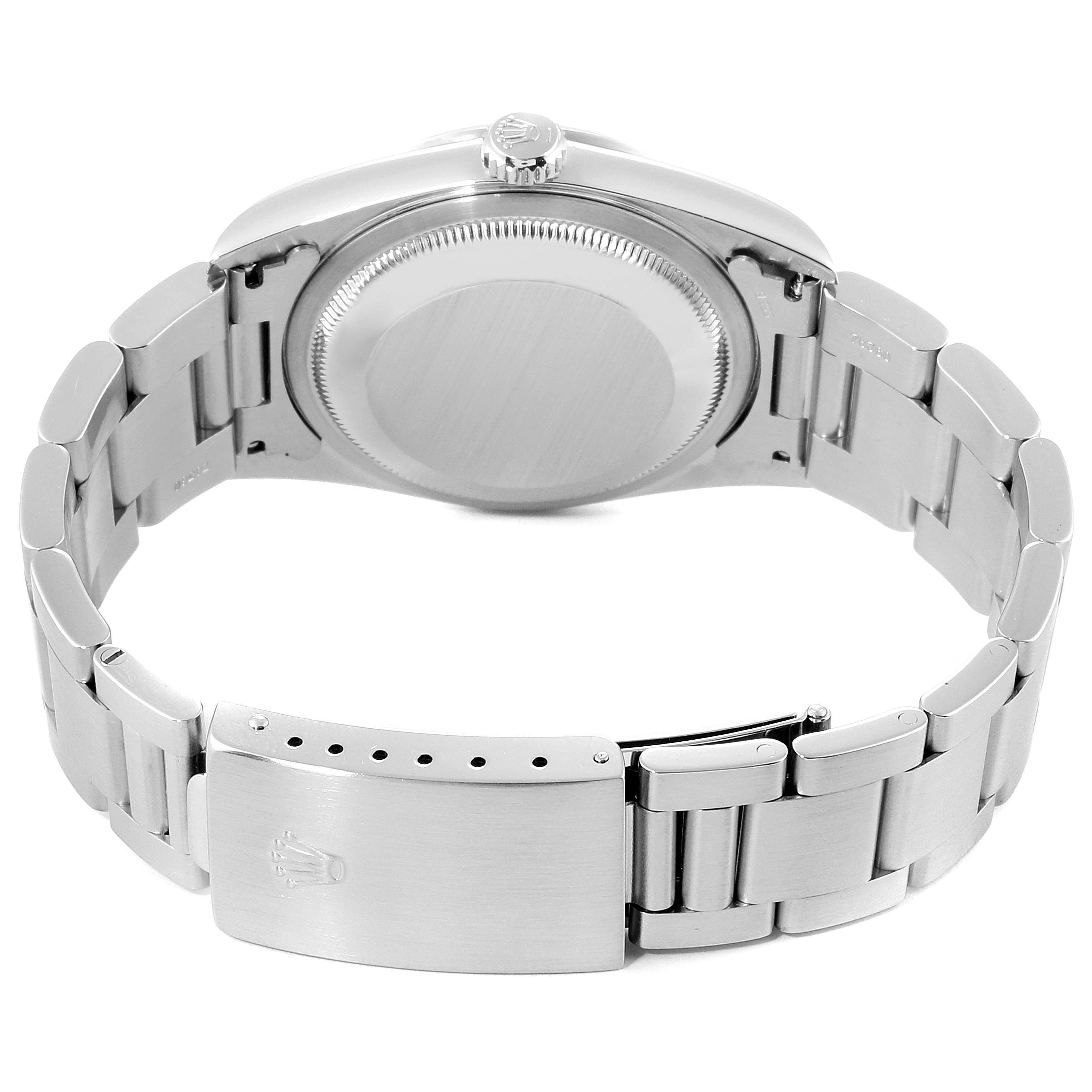 The image shows the back view of the Rolex Datejust 16200 Men's Stainless Steel Black Dial 16200 Men's Stainless Steel Black Dial watch, featuring its case back, crown, and metal bracelet with the clasp.