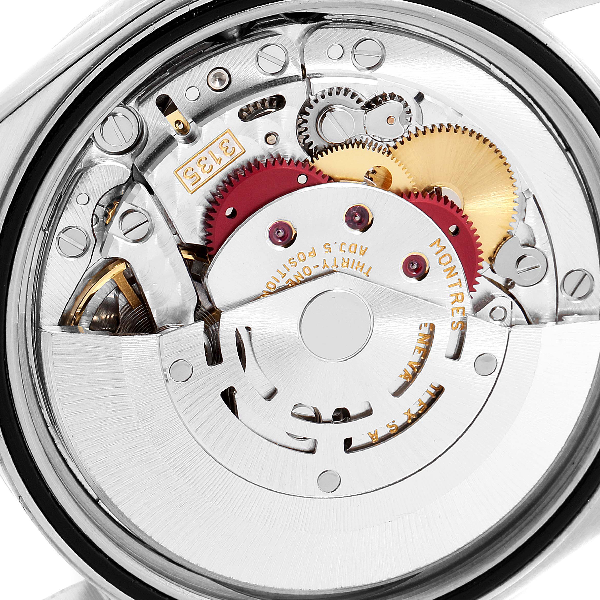 This image shows a close-up of the inner mechanical movement of a Rolex Datejust 16220 Men's Stainless Steel Blue Dial 16220 Men's Stainless Steel Blue Dial watch.