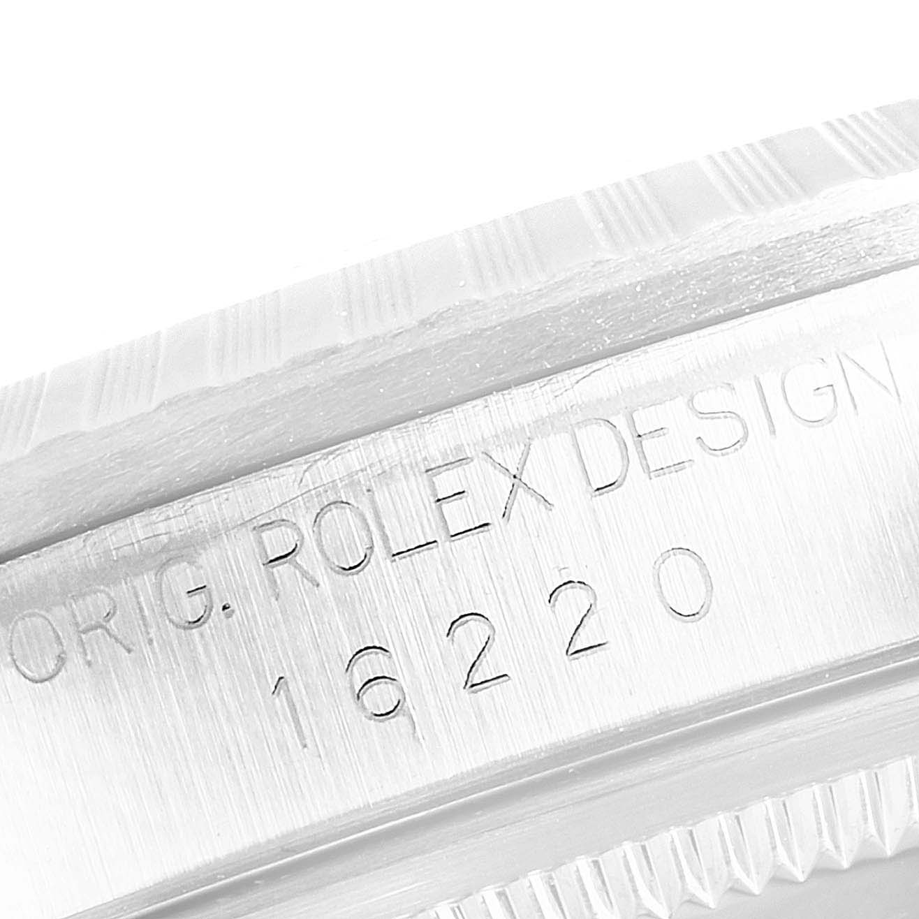 This image shows a close-up view of the case side engraving on a Rolex Datejust 16220 Men's Stainless Steel Blue Dial 16220 Men's Stainless Steel Blue Dial model, displaying the model number 16220.