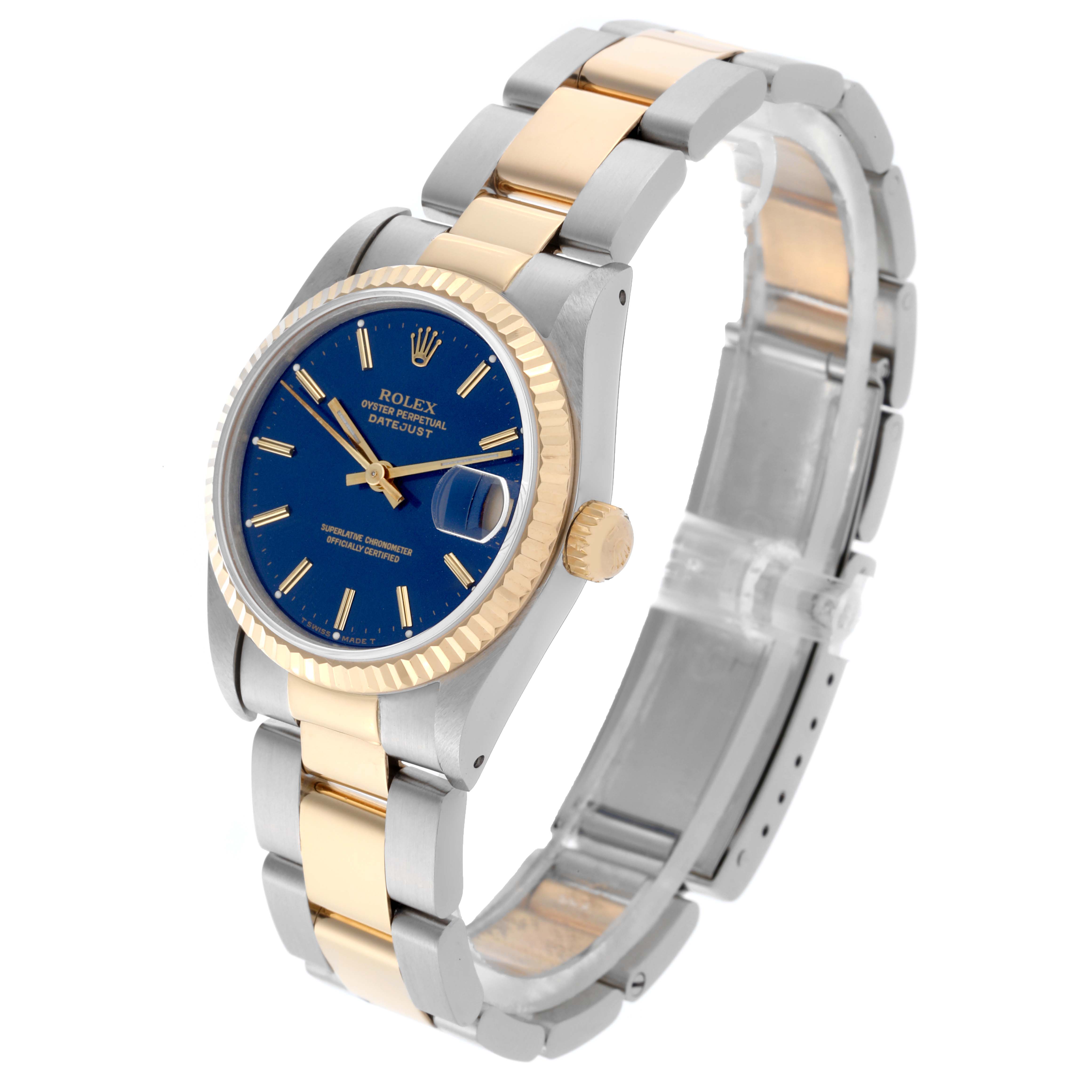The Rolex Mid-Size 68273 Women's Steel and Gold (two tone) Blue Dial 68273 Women's Steel and Gold (two tone) Blue Dial model is shown at a three-quarter angle, highlighting the face, two-tone bracelet, and bezel.