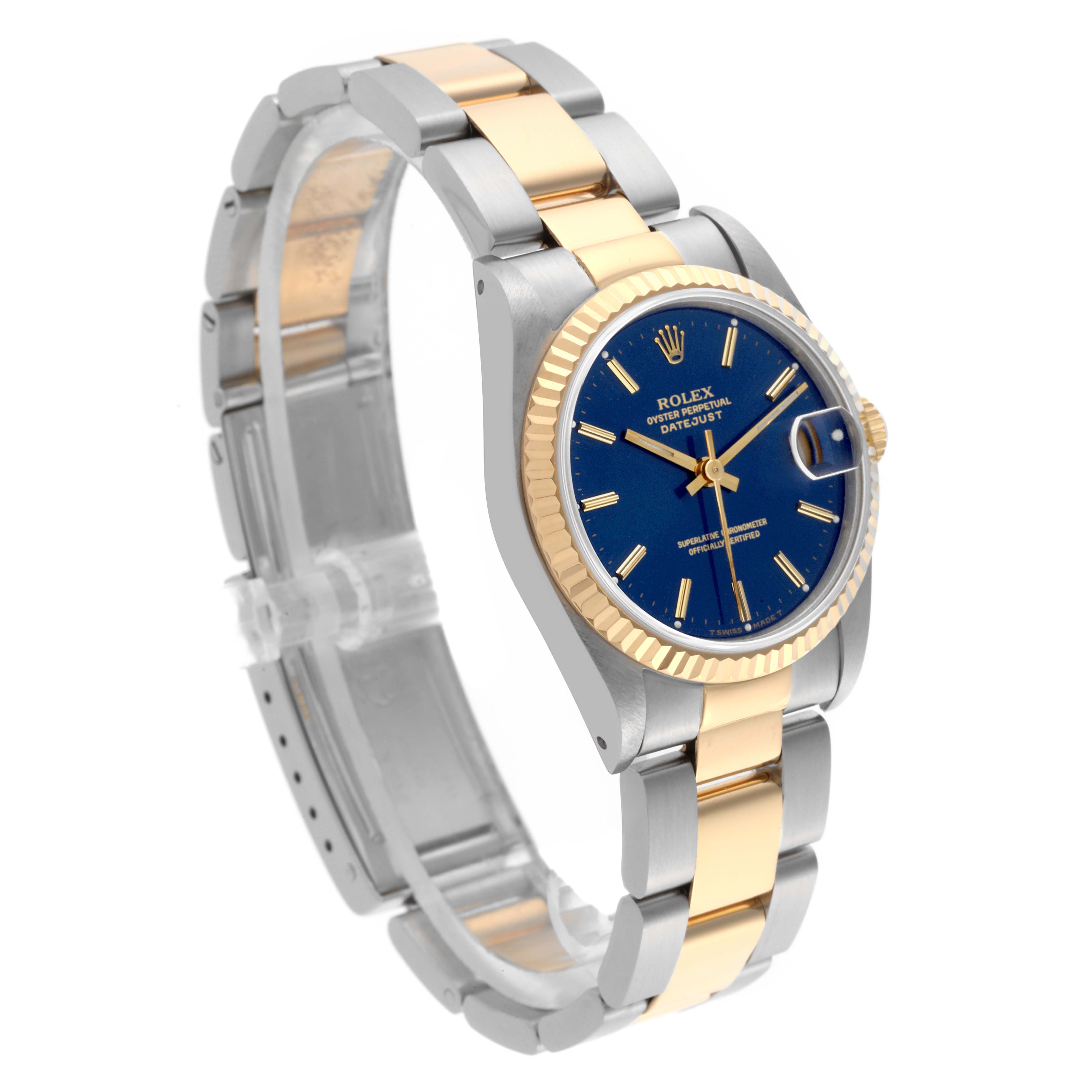 The Rolex Mid-Size 68273 Women's Steel and Gold (two tone) Blue Dial 68273 Women's Steel and Gold (two tone) Blue Dial watch is angled to show the face, bezel, and bracelet, highlighting its two-tone design.