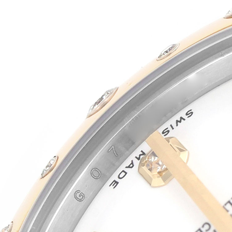 The image shows a close-up of the Rolex Datejust 178343 Women's Steel and Gold (two tone) White Dial watch bezel with diamond accents and partial dial markings.