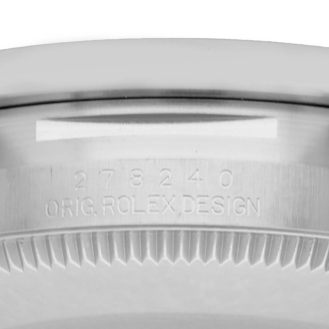 The image shows a close-up of the case back, featuring the model number and "ORIG. ROLEX DESIGN" engraving on a Rolex Mid-Size 278240 Women
s Stainless Steel White Dial watch.