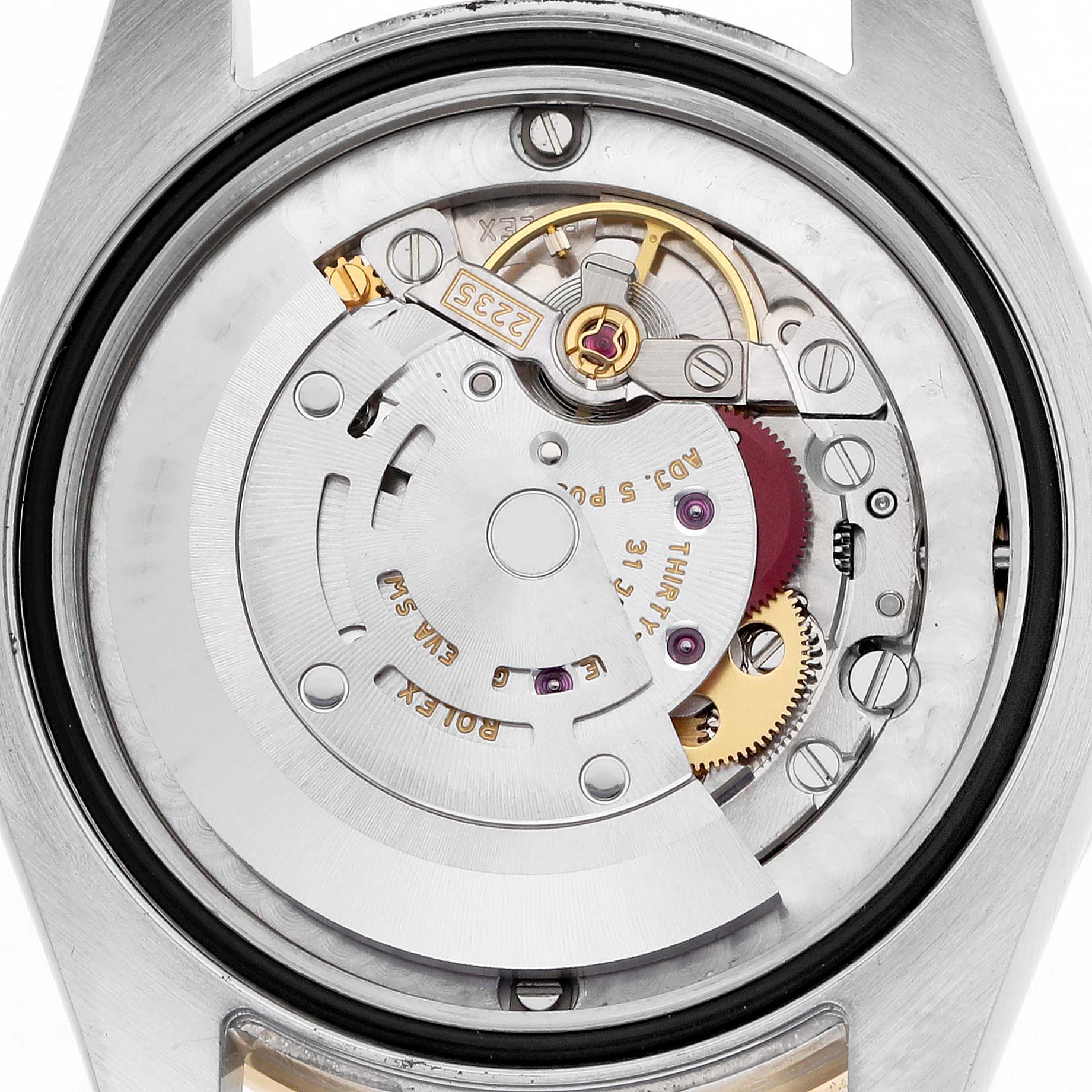 The image shows the inner mechanism of a Rolex Mid-Size 178383 Women
s Steel and Gold (two tone) Mother of Pearl Dial model, viewed from the back, displaying gears and the rotor.