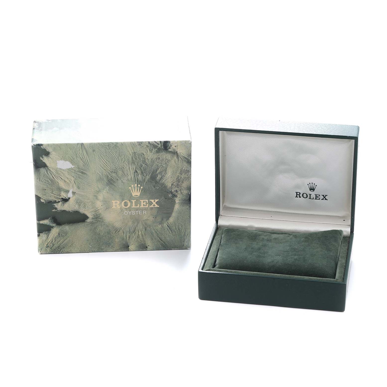 The image shows a Rolex Datejust 68273 Women
s Steel and Gold (two tone) Champagne Dial packaging box and an open green watch case with branding visible inside.