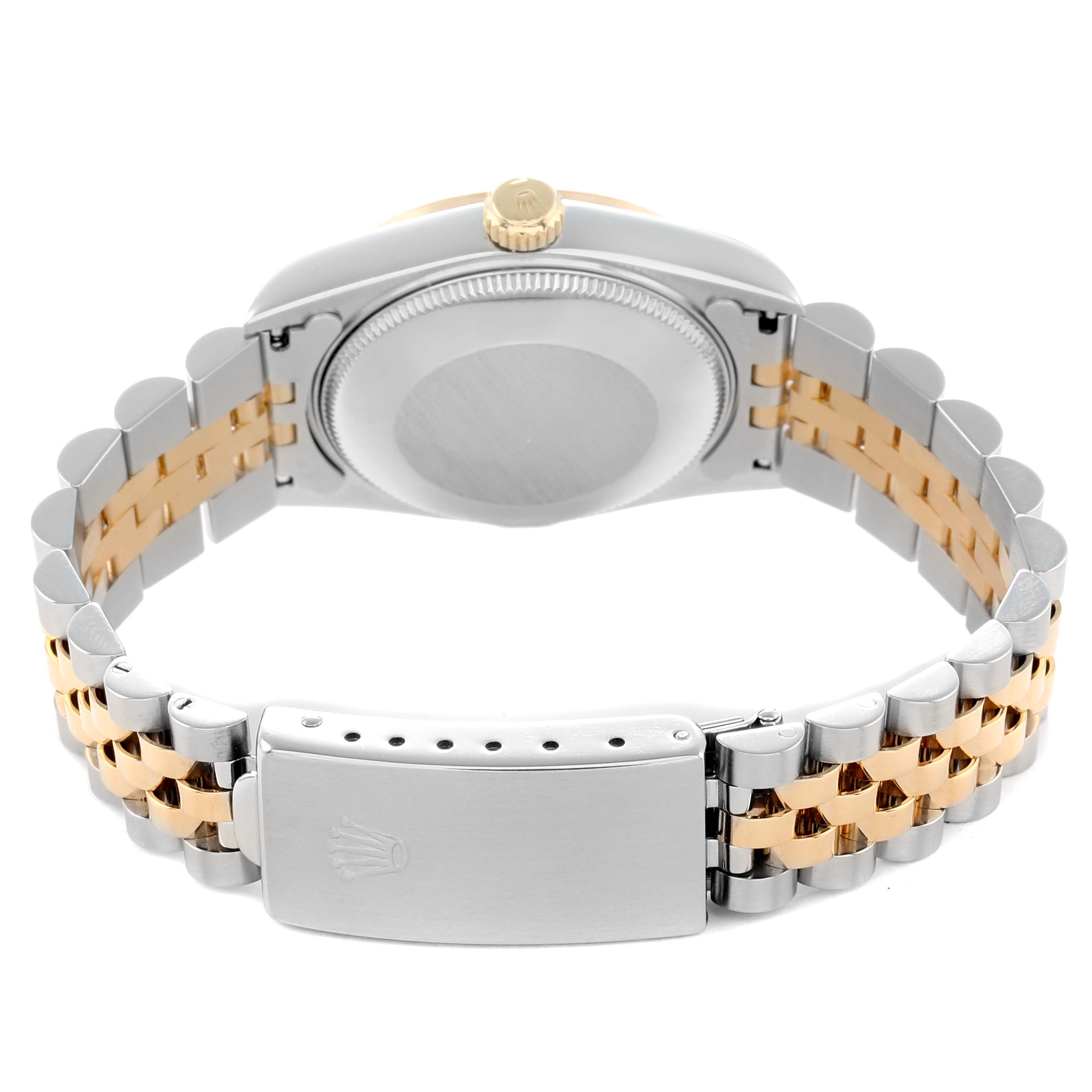 The image shows the back view of a Rolex Mid-Size 68273 Women
s Steel and Gold (two tone) Black Dial watch, highlighting the clasp, bracelet, and case back.