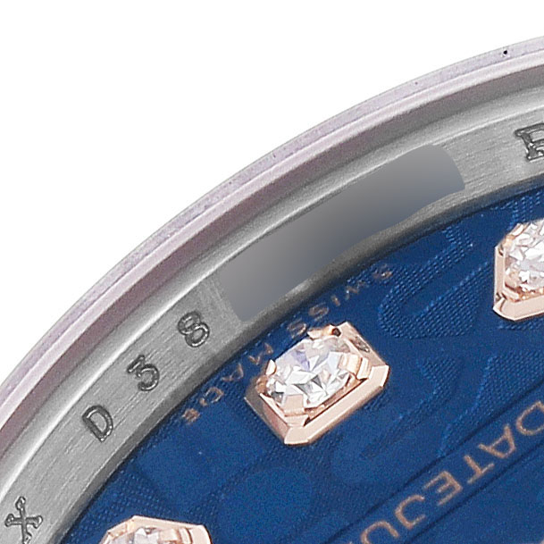 The image shows a partial side view of a Rolex Datejust 179171 Women's Steel and Gold (two tone) Blue Dial watch face, highlighting diamond hour markers on a blue dial.