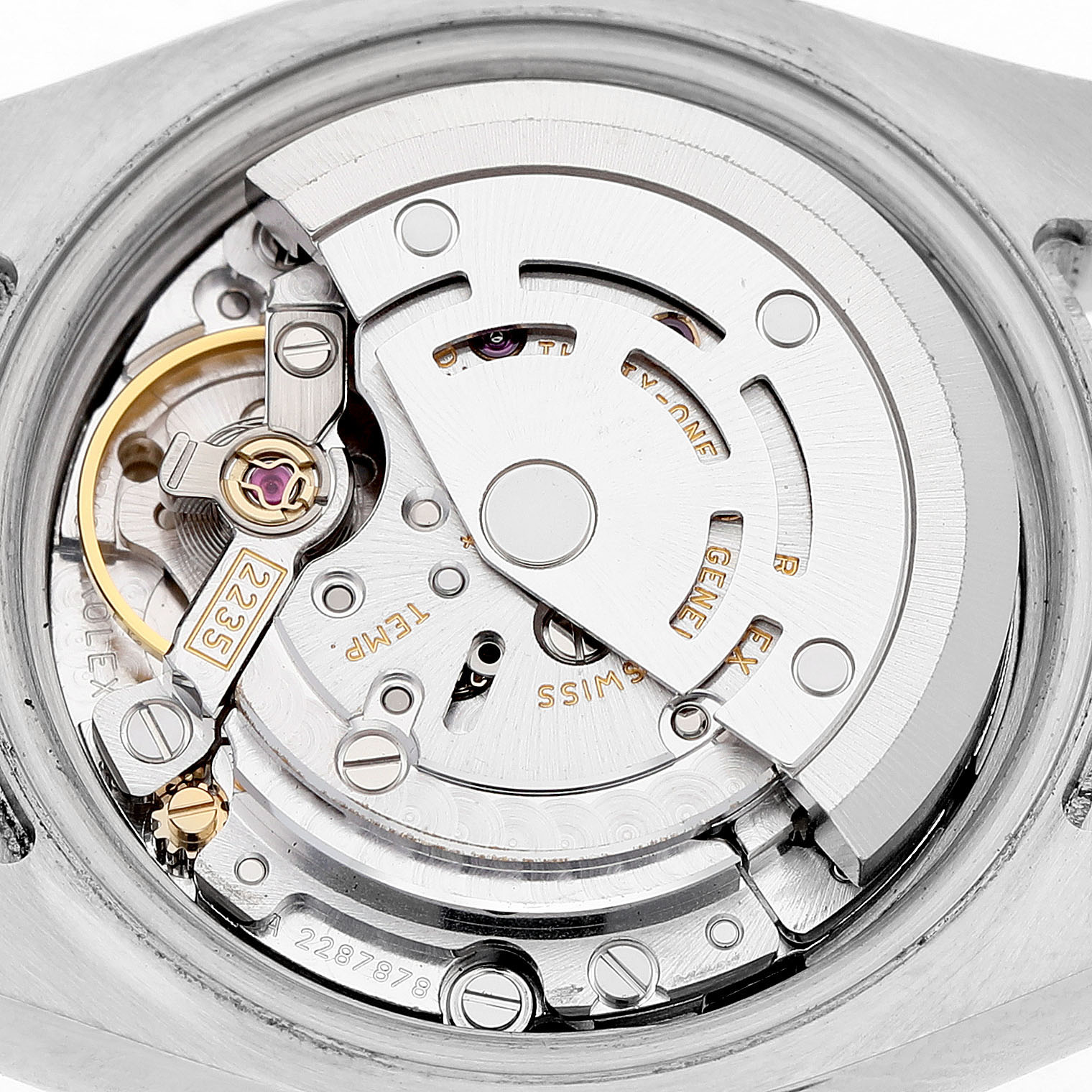 The image shows the movement of a Rolex Datejust 179171 Women's Steel and Gold (two tone) Blue Dial, focusing on its intricate mechanical parts from the back.