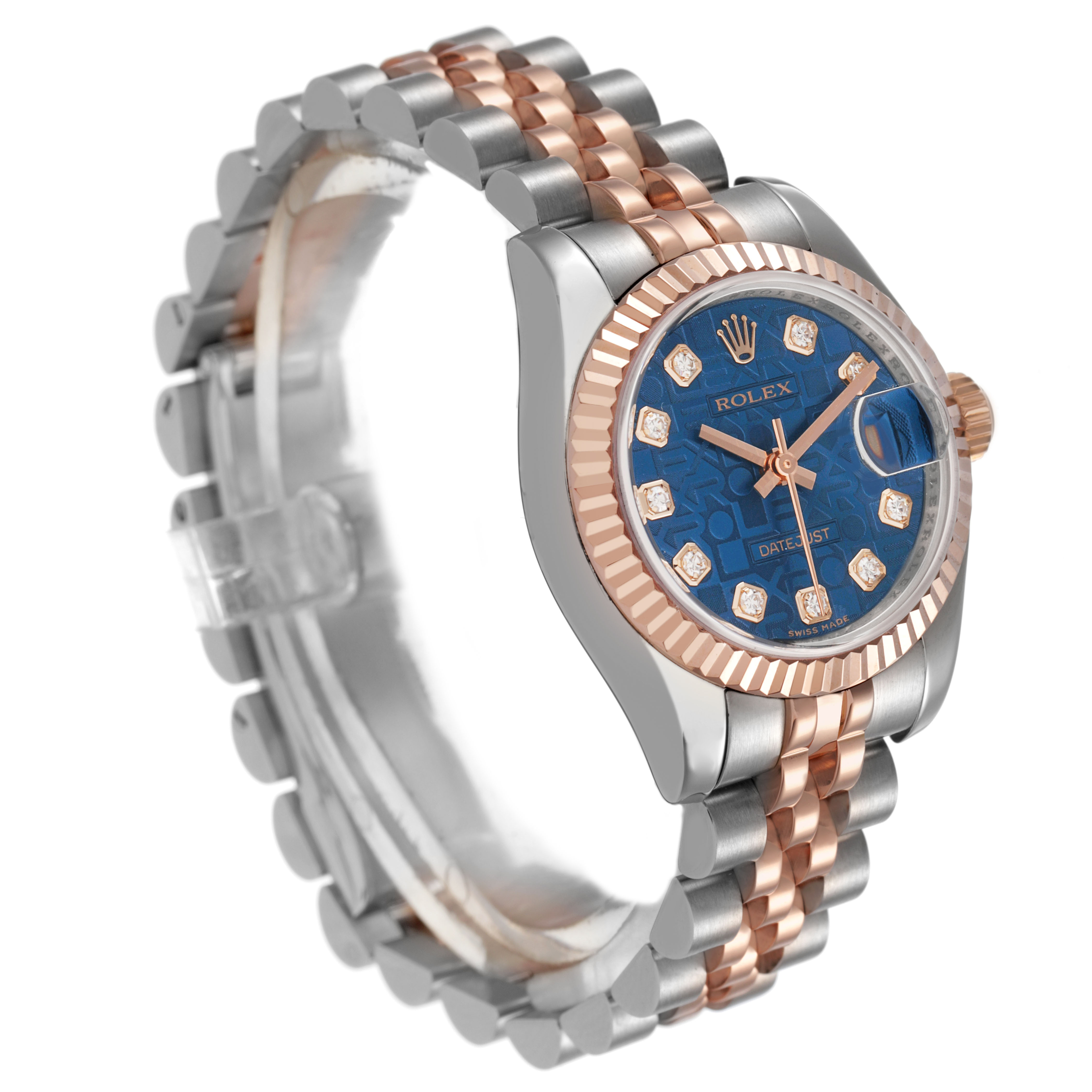 The Rolex Datejust 179171 Women's Steel and Gold (two tone) Blue Dial watch is shown at a three-quarter angle, highlighting the blue dial, fluted bezel, and two-tone bracelet.