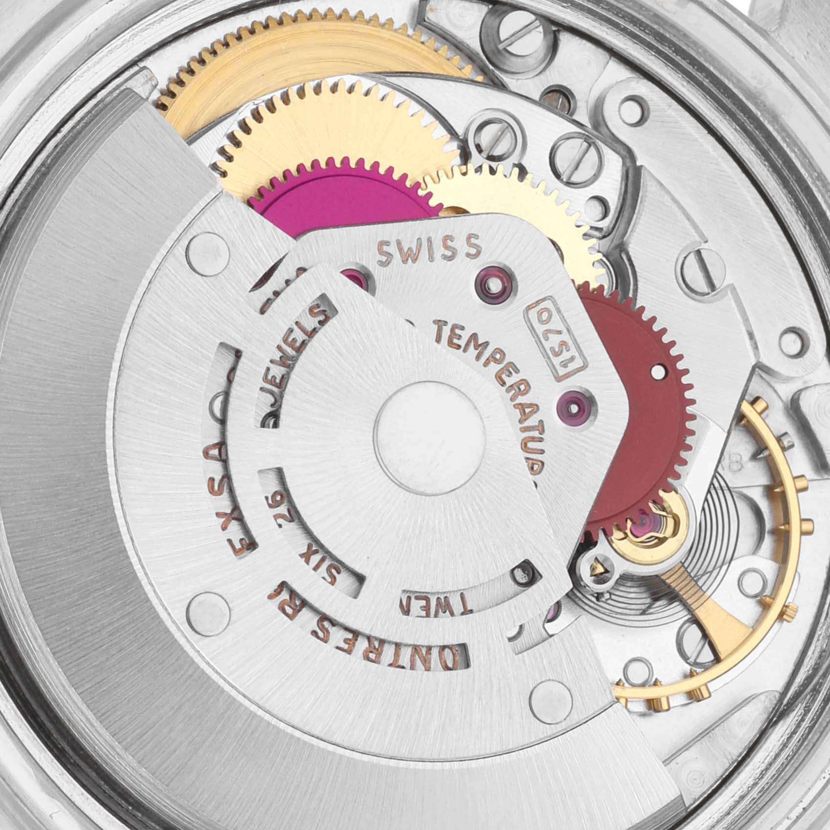 The image shows the movement of a Rolex Vintage Collection 1603 Men's Stainless Steel Silver Dial 1603 Men's Stainless Steel Silver Dial watch from a top-down angle, highlighting gears and mechanical components.