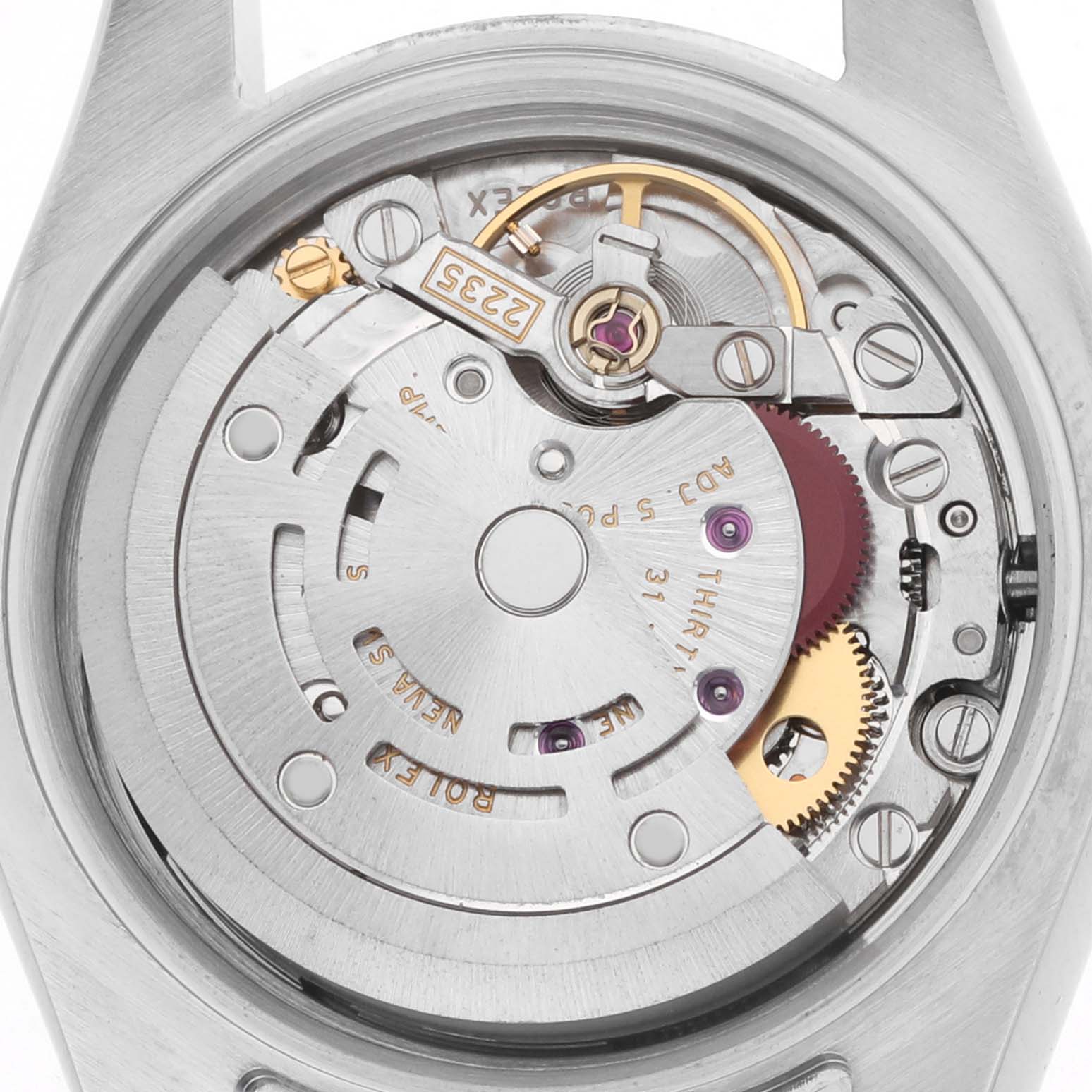 The image shows the internal mechanism of a Rolex Datejust 179171 Women
s Steel and Gold (two tone) Black Dial watch at a close-up angle, highlighting the movement components.