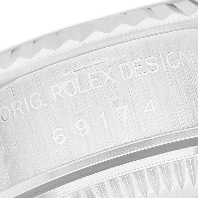 The image shows a close-up of the side of the Rolex Datejust 69174 Women's Stainless Steel Pink Dial with the model number engraved.