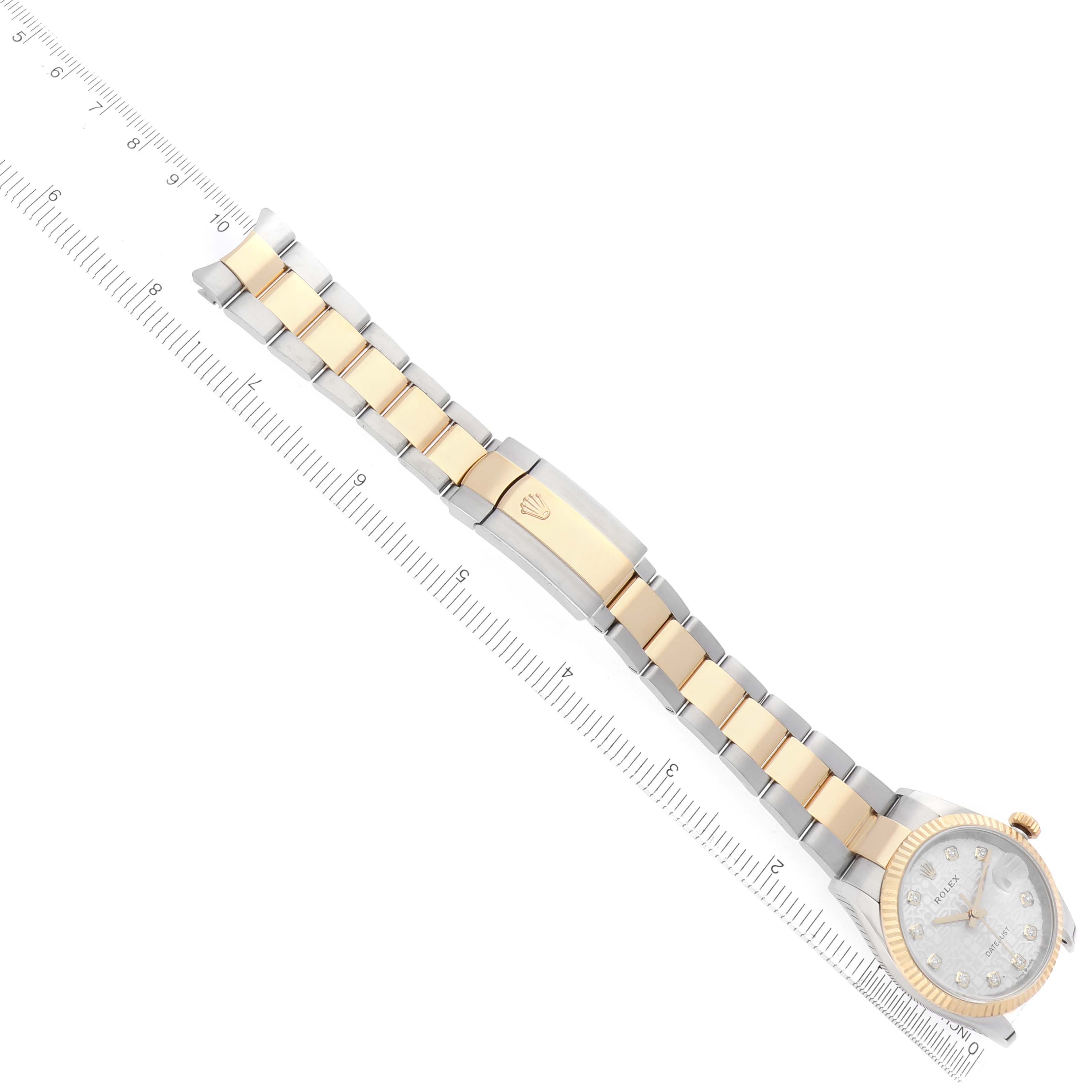 The Rolex Datejust 126233 Men
s Steel and Gold (two tone) Silver Dial watch is shown from a top-down angle, displaying its dial, bezel, and full metal bracelet.