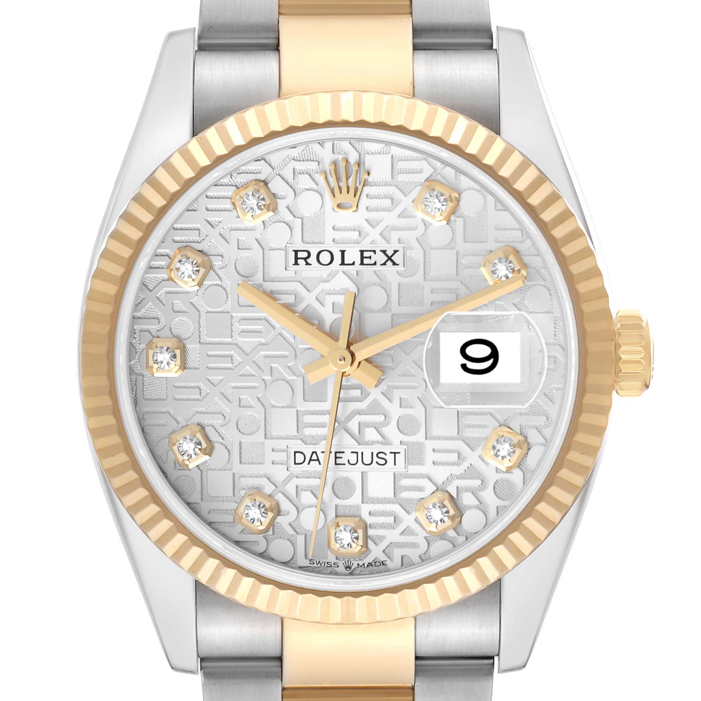 The Rolex Datejust 126233 Men
s Steel and Gold (two tone) Silver Dial watch is shown from a front angle, displaying the dial, fluted bezel, and part of the bracelet.