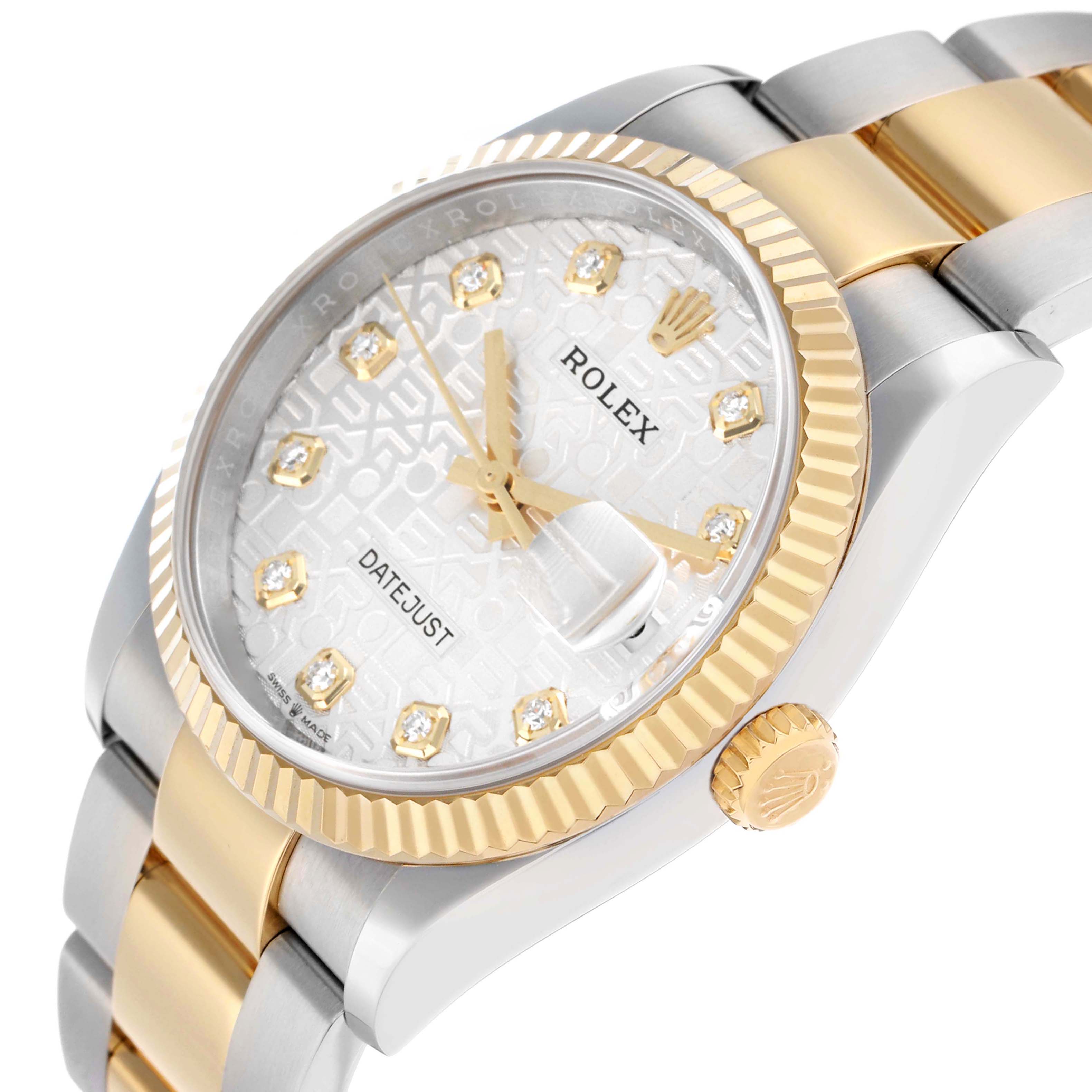 The Rolex Datejust 126233 Men
s Steel and Gold (two tone) Silver Dial watch is shown at an angled view highlighting the dial, bezel, crown, and bracelet.